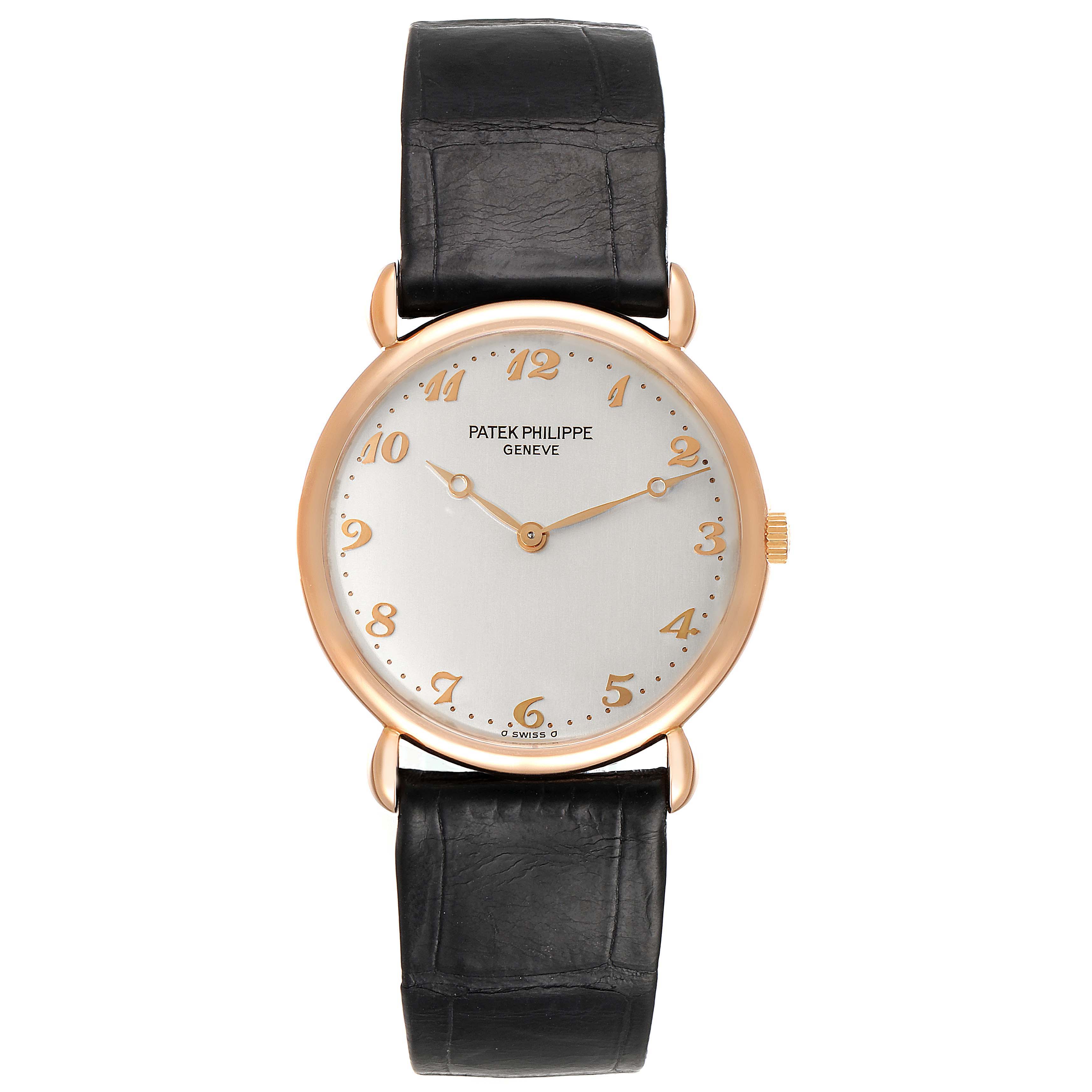 The image shows a Patek Philippe Calatrava 3820 Men's Rose Gold Silver Dial 3820 Men's Rose Gold Silver Dial watch from a front angle, highlighting the face, hands, numerals, and black leather strap.