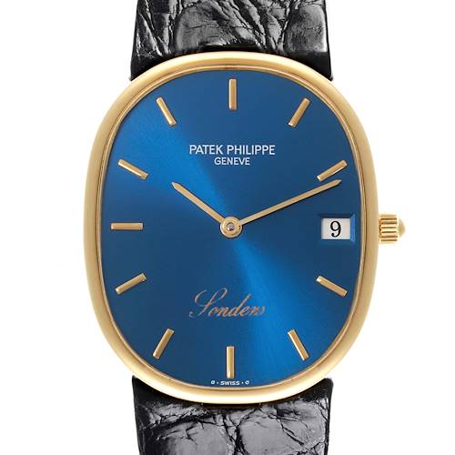 The image shows a Patek Philippe Golden Ellipse watch face-on, highlighting the blue dial, gold markers, and date window.