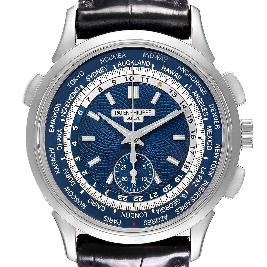 The Patek Philippe Complications watch is shown from a front angle, displaying the dial, bezel, and part of the leather strap.