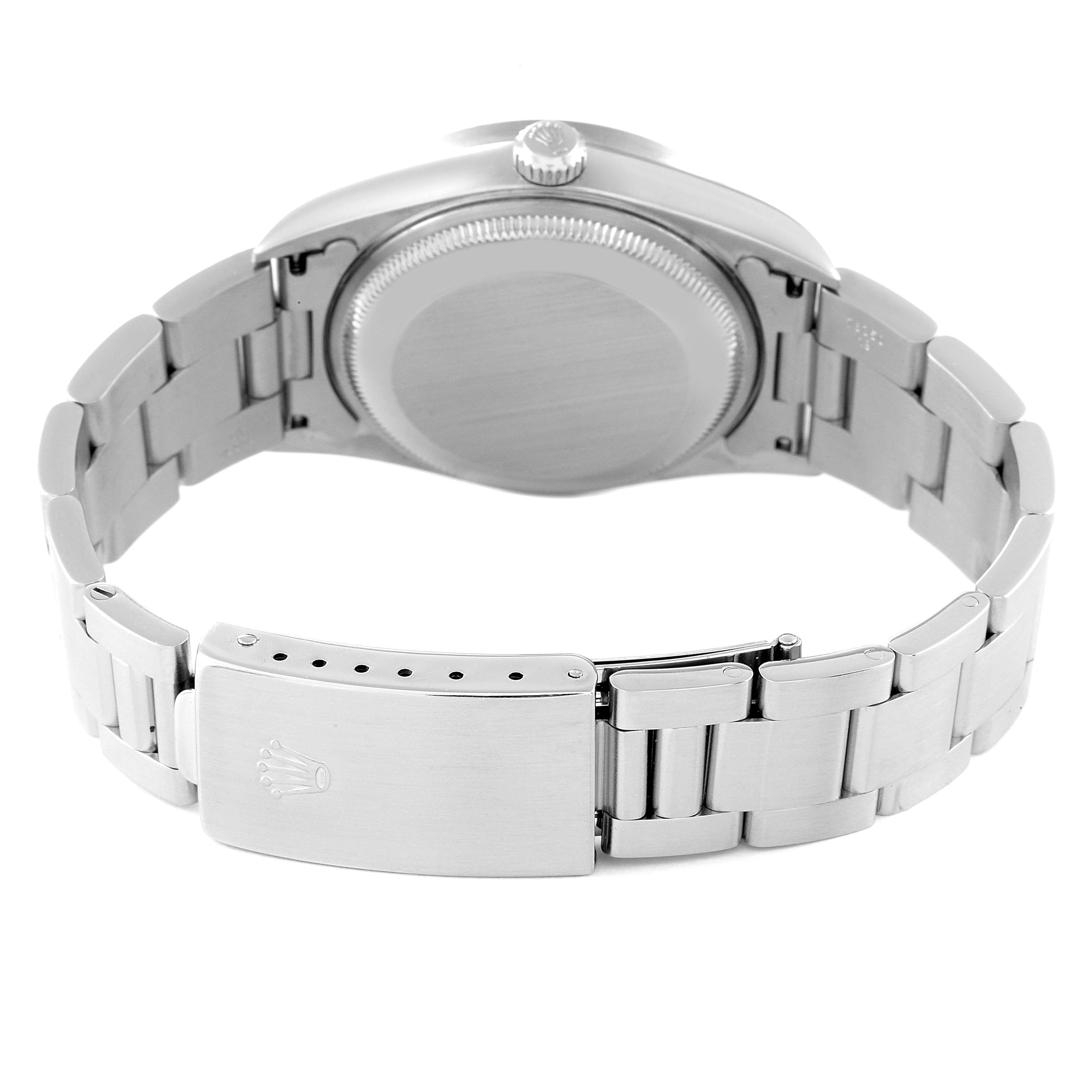 The image shows the back case and clasp of a Rolex Date 15210 Men
s Stainless Steel Blue Dial 15210 Men
s Stainless Steel Blue Dial model watch from a rear angle.