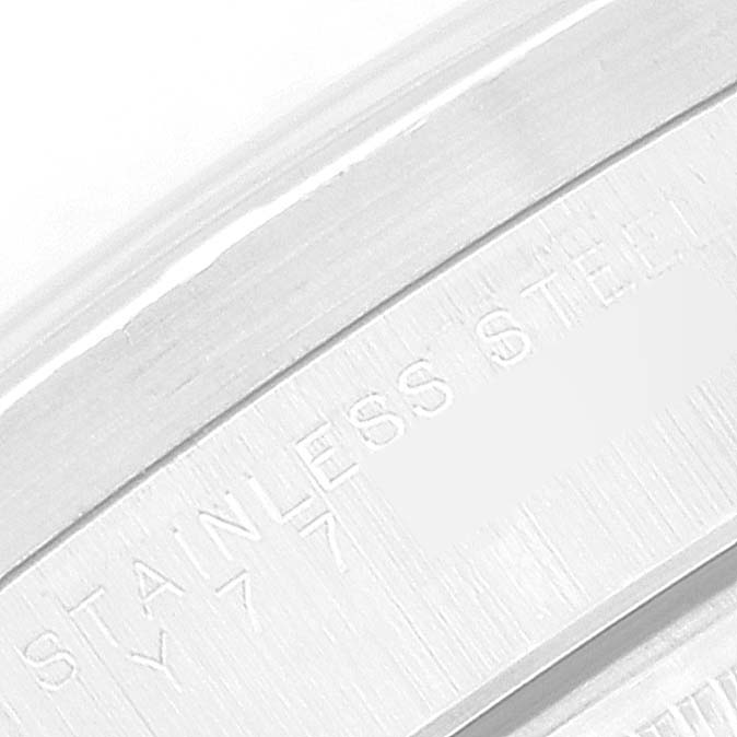 The image shows a close-up of the stainless steel case back of the Rolex Date 15210 Men
s Stainless Steel Blue Dial 15210 Men
s Stainless Steel Blue Dial model watch.