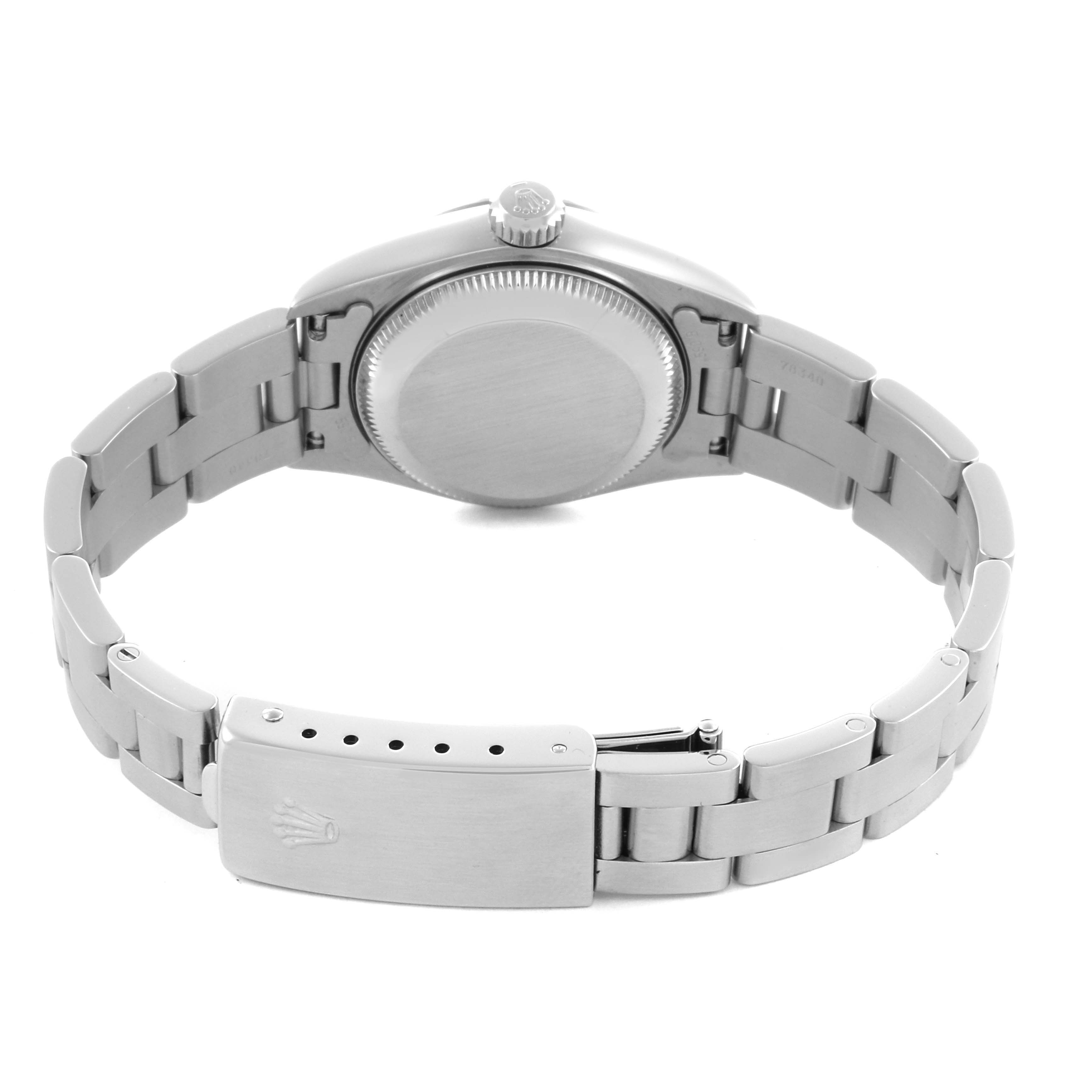 The Rolex Date 69240 Women's Stainless Steel Silver Dial 69240 Women's Stainless Steel Silver Dial watch is shown from the back, highlighting the case back and metal bracelet with clasp.