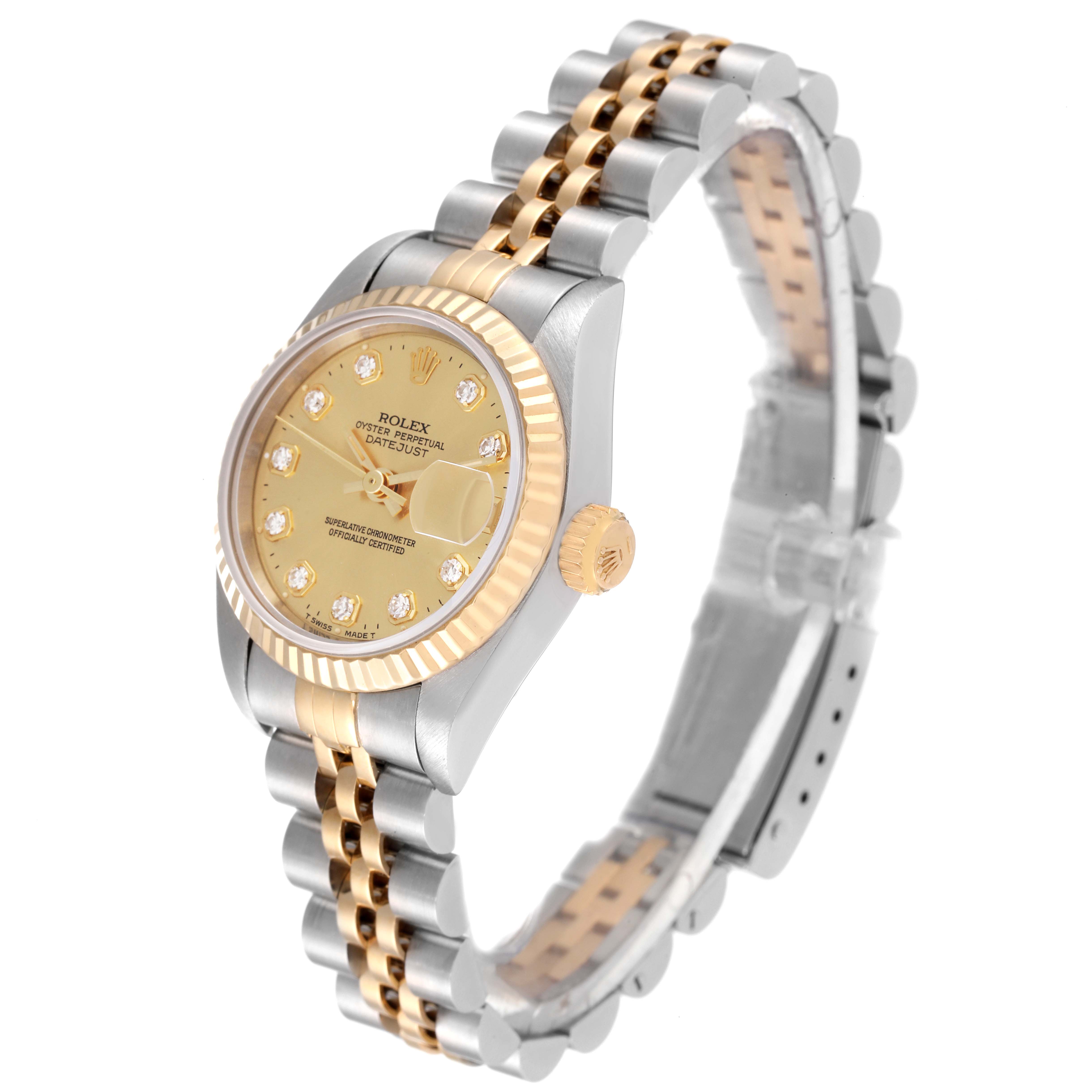 The Rolex Datejust 69173 Women's Steel and Gold (two tone) Champagne Dial 69173 Women's Steel and Gold (two tone) Champagne Dial watch is shown at an angled view, highlighting its two-tone bracelet, gold dial, fluted bezel, and crown.