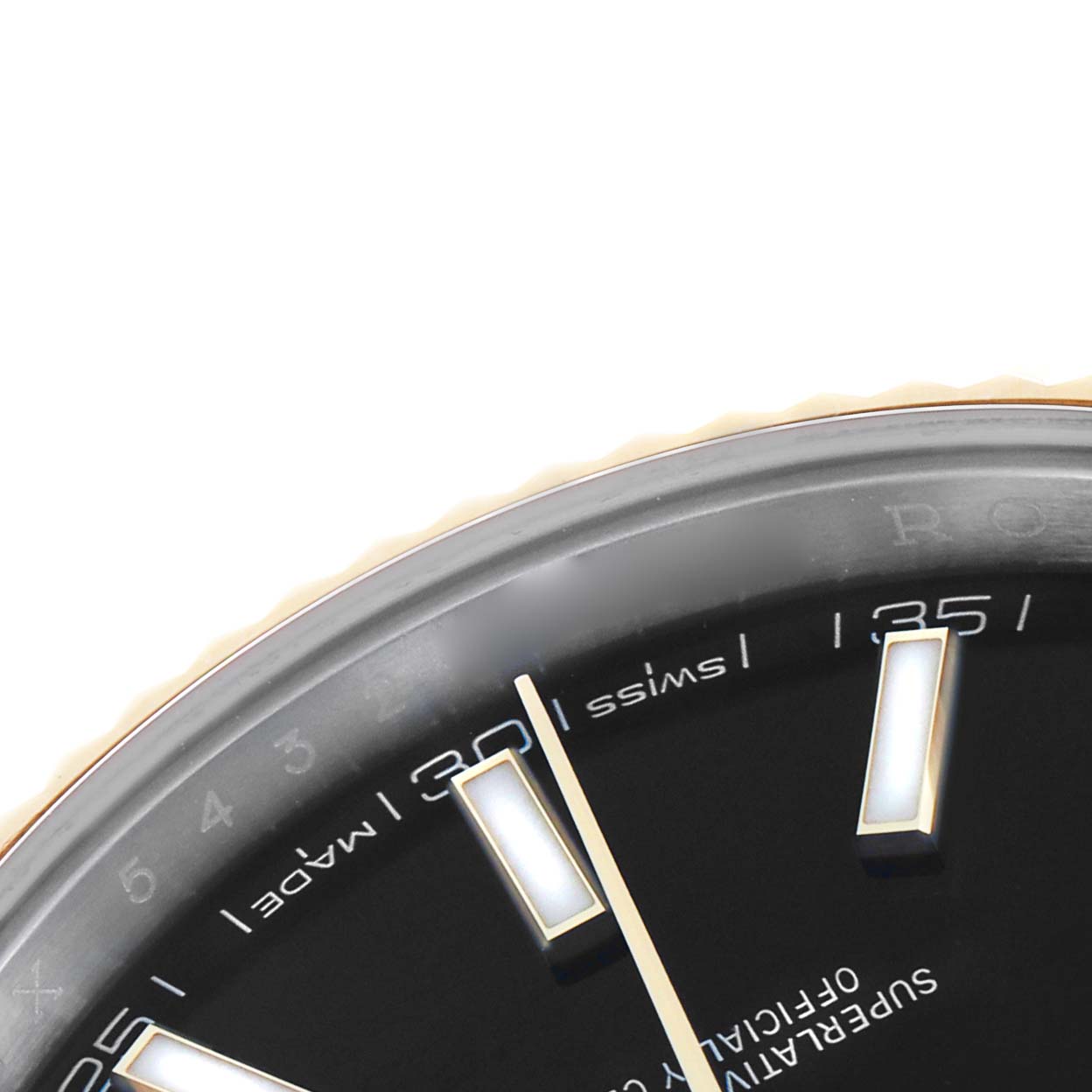 The image shows a close-up of the dial and bezel edge of a Rolex Datejust 41 126333 Men's Steel and Gold (two tone) Black Dial, focusing on the markers and text.
