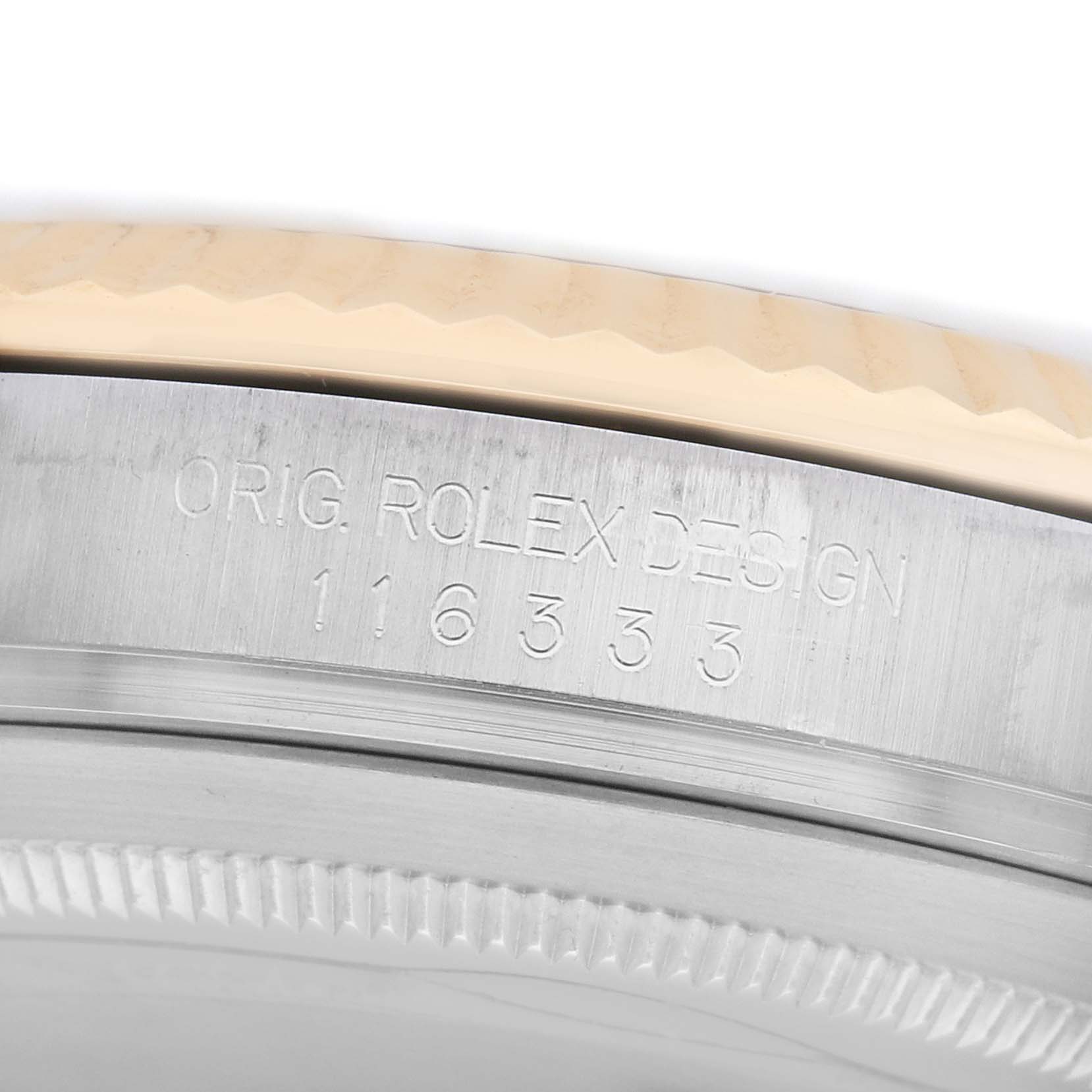 This close-up image of the Rolex Datejust 41 116333 Men's Steel and Gold (two tone) Champagne Dial shows the watch's side, highlighting the engraved model number and case edge.