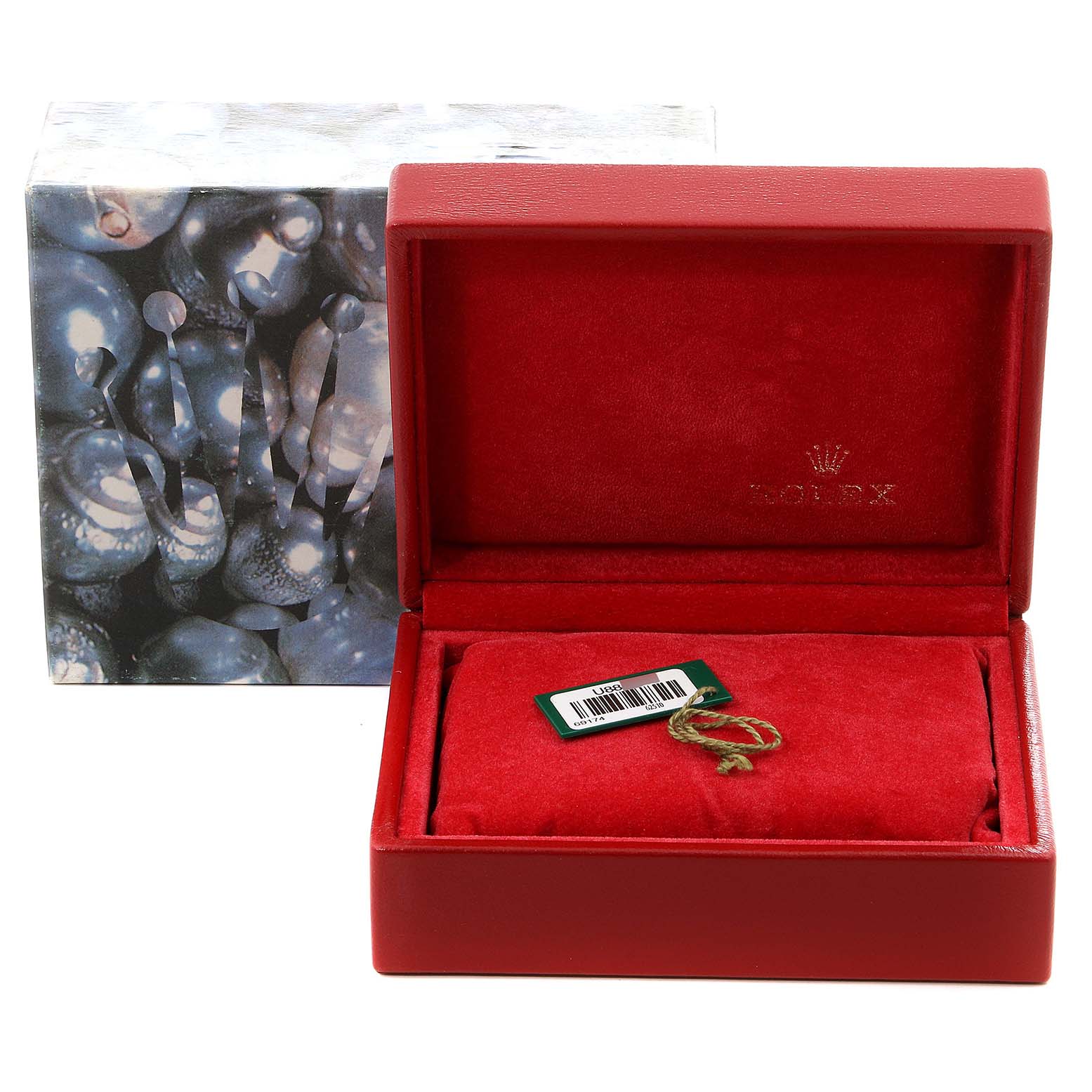 The image shows an empty red Rolex Datejust 69174 Women
s Stainless Steel Pink Dial 69174 Women
s Stainless Steel Pink Dial watch box with a pillow and hang tag, with the outer box in the background.