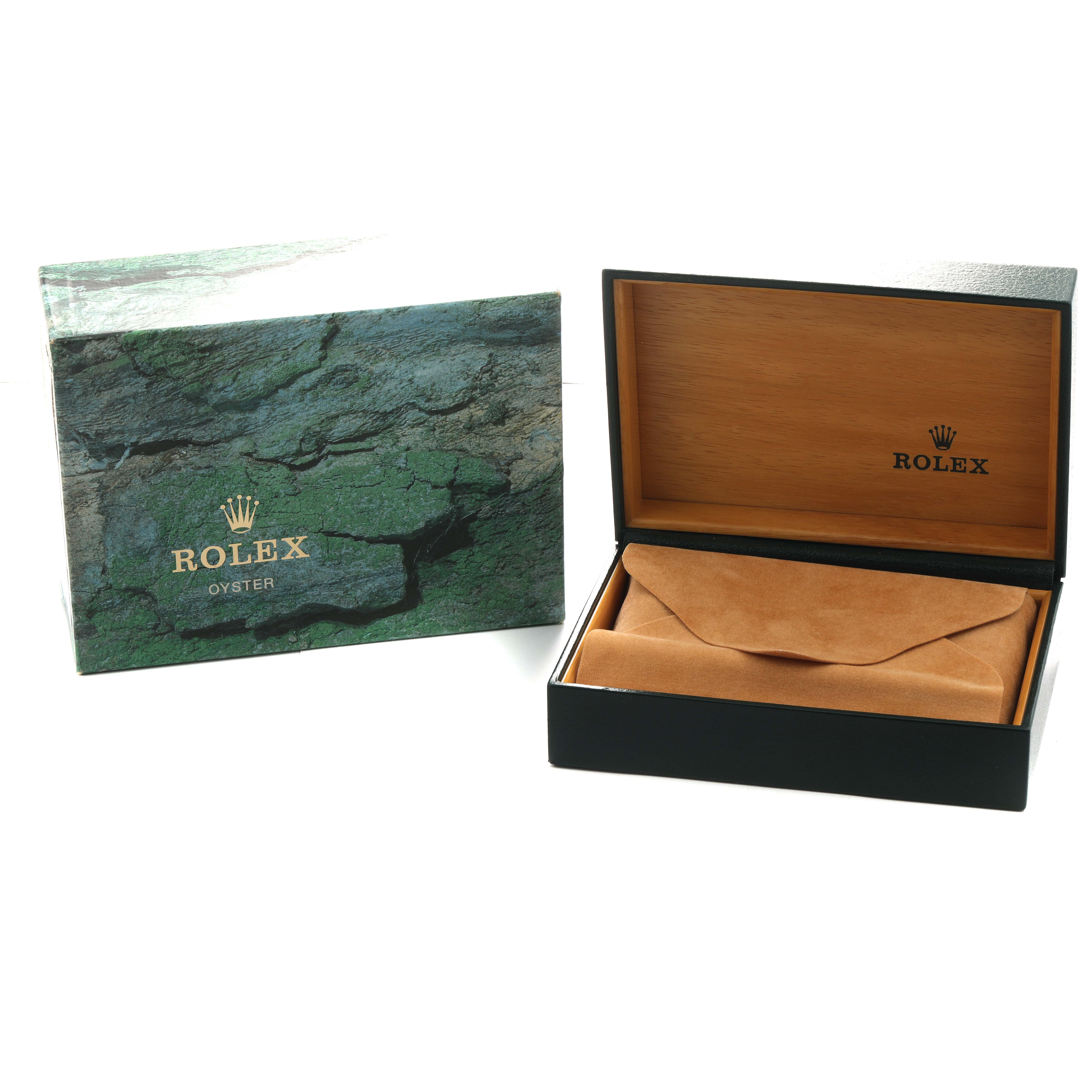 The image shows a Rolex Oyster box and an open empty case, viewed from the front.