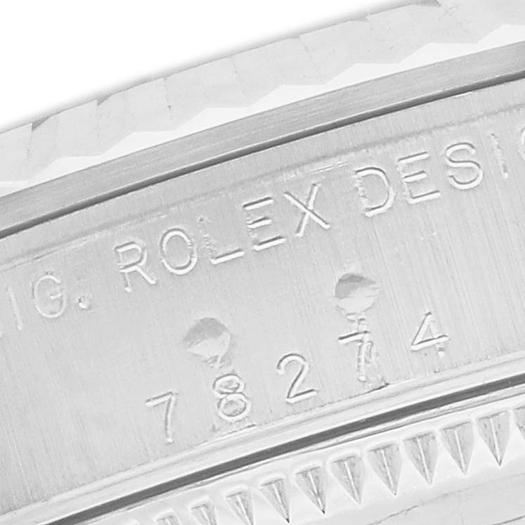 The image shows an engraved side view of a Rolex Mid-Size 78274 Women's Stainless Steel Mother of Pearl Dial model, featuring a serial number and part of the bezel.