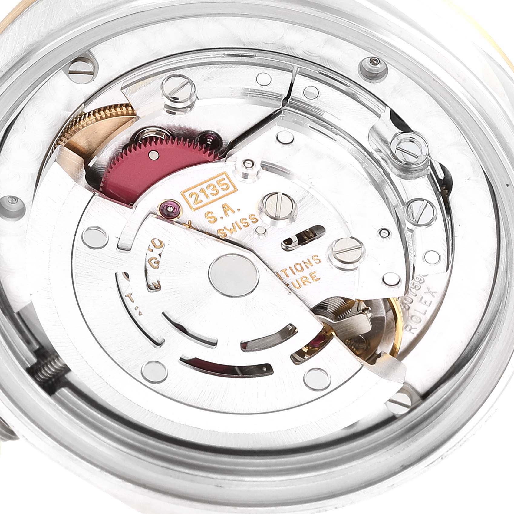 This image shows the intricate internal movement parts of a Mid-Size Rolex watch from a close-up, angled view.