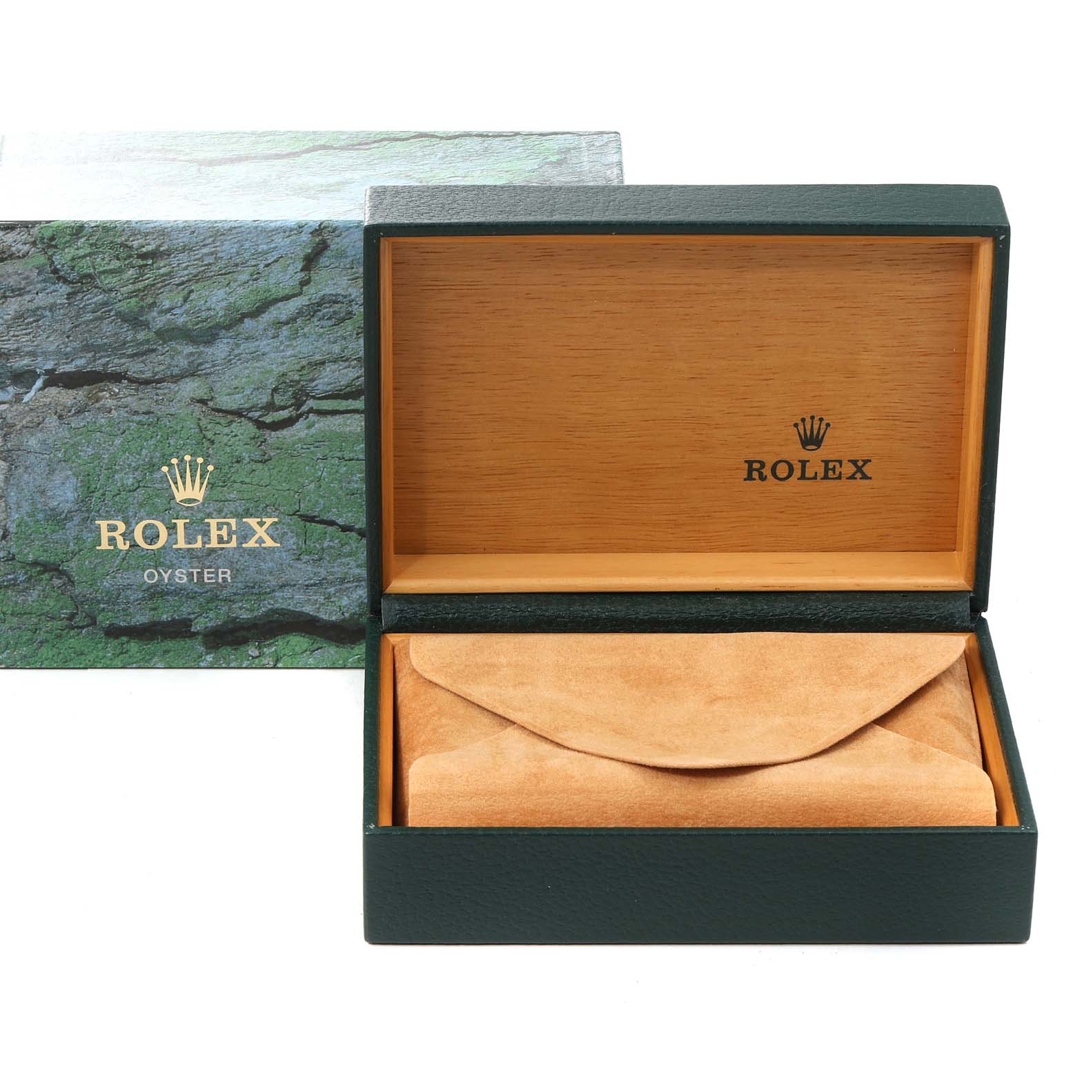 This image shows an open Rolex watch box with the inner tan suede pouch visible and an outer green box behind it.