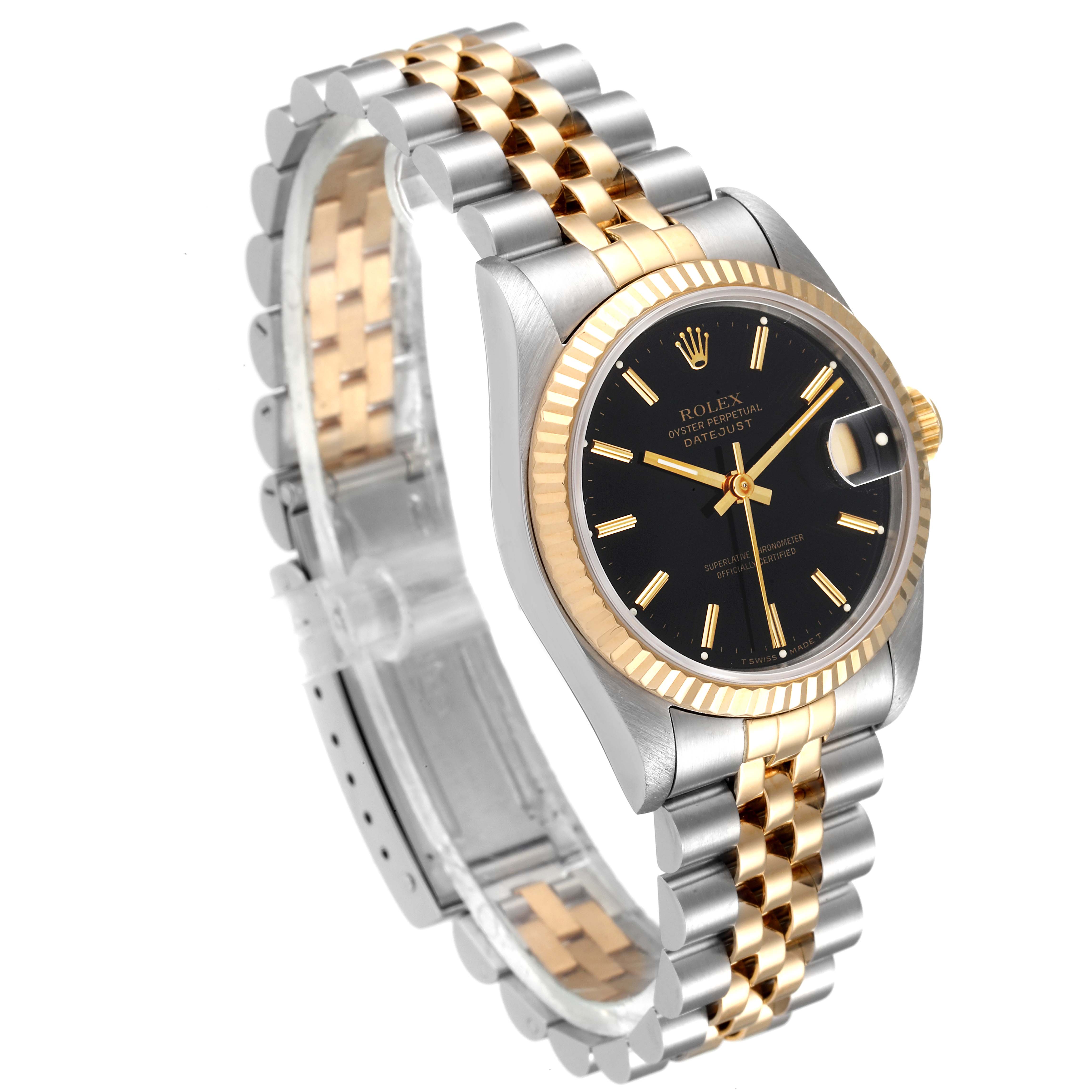 This image shows a Rolex Datejust Mid-Size watch at a slight angle, highlighting its two-tone bracelet, black dial, and fluted bezel.