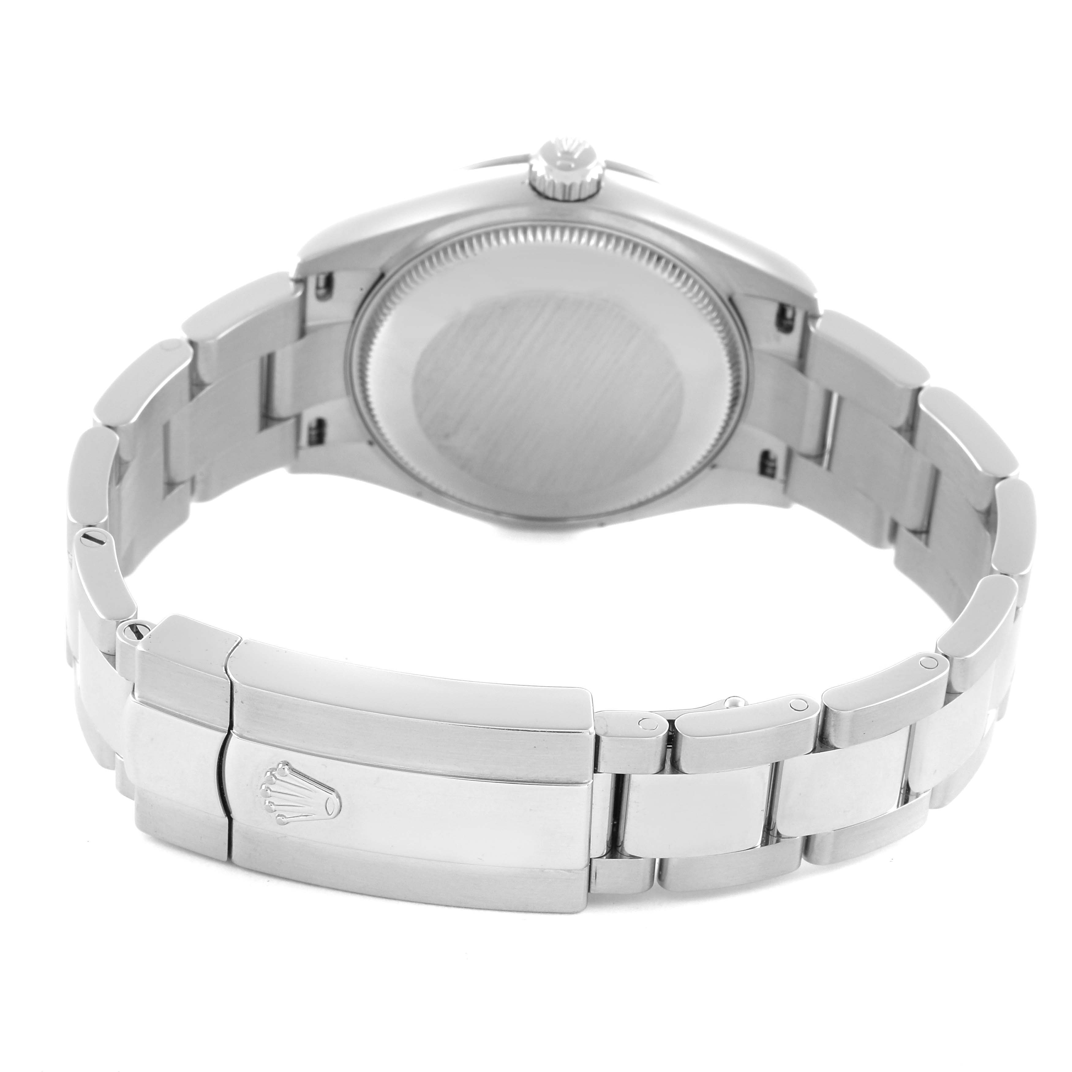 The Rolex Mid-Size 278274 Women's Stainless Steel Blue Dial 278274 Women's Stainless Steel Blue Dial watch is shown from the back, displaying the clasp and case back with the bracelet partially extended.