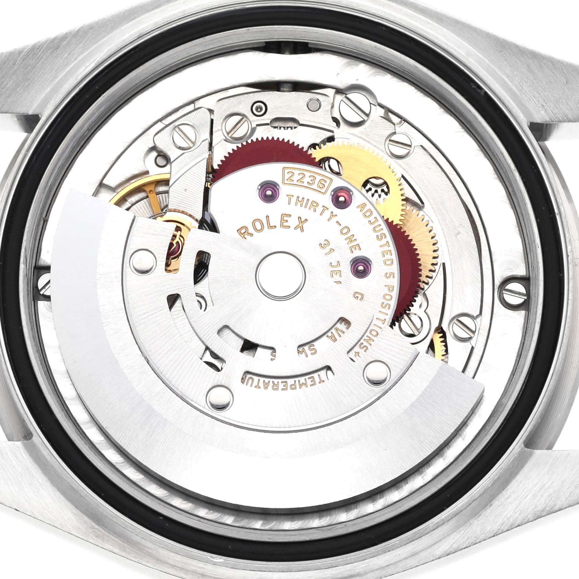 The image shows the internal movement of a Rolex Mid-Size 278274 Women's Stainless Steel Blue Dial 278274 Women's Stainless Steel Blue Dial model, viewed from the back.