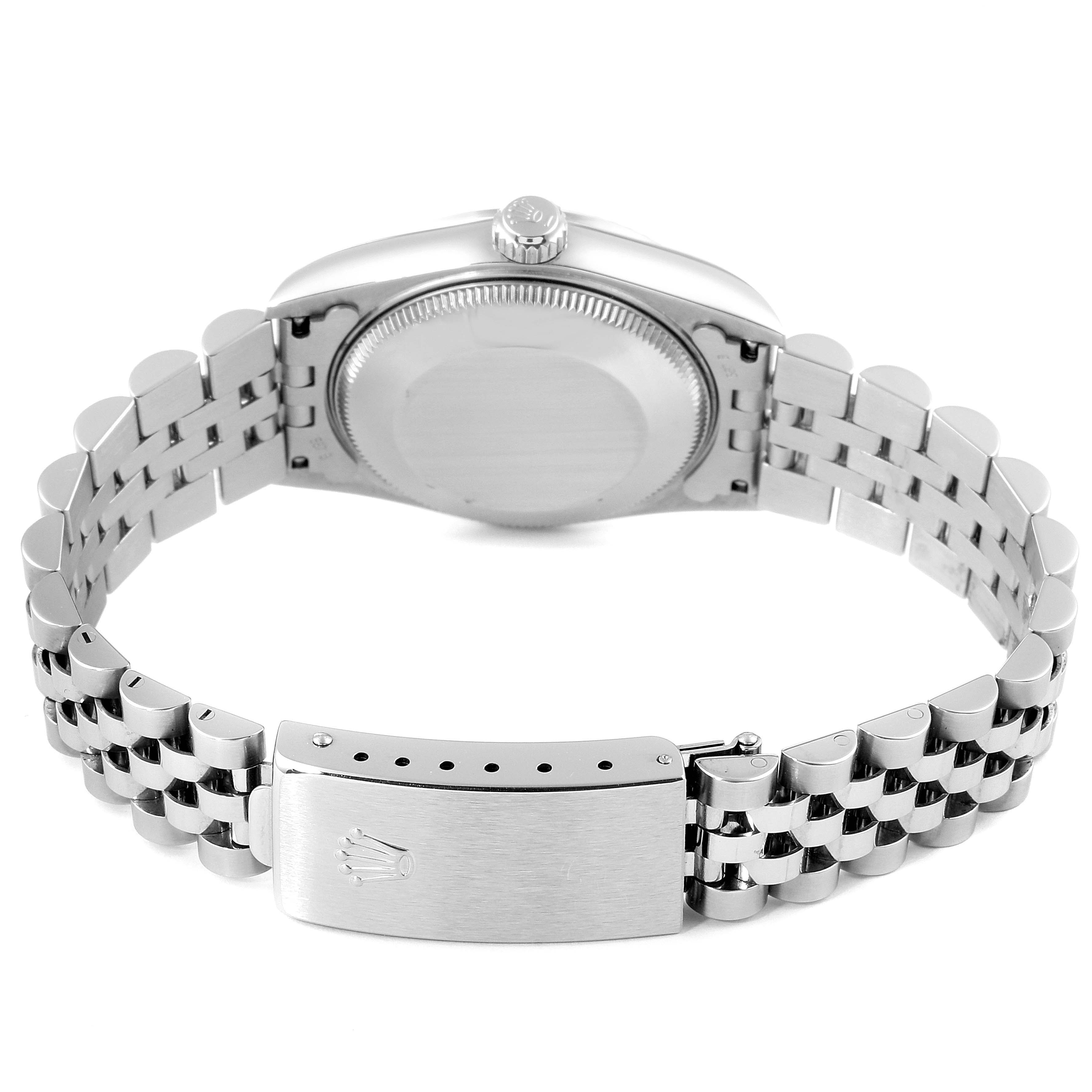 The image shows a rear view of a Rolex Mid-Size 78274 Women
s Stainless Steel Mother of Pearl Dial 78274 Women
s Stainless Steel Mother of Pearl Dial model watch, highlighting the case back, bracelet, and clasp.