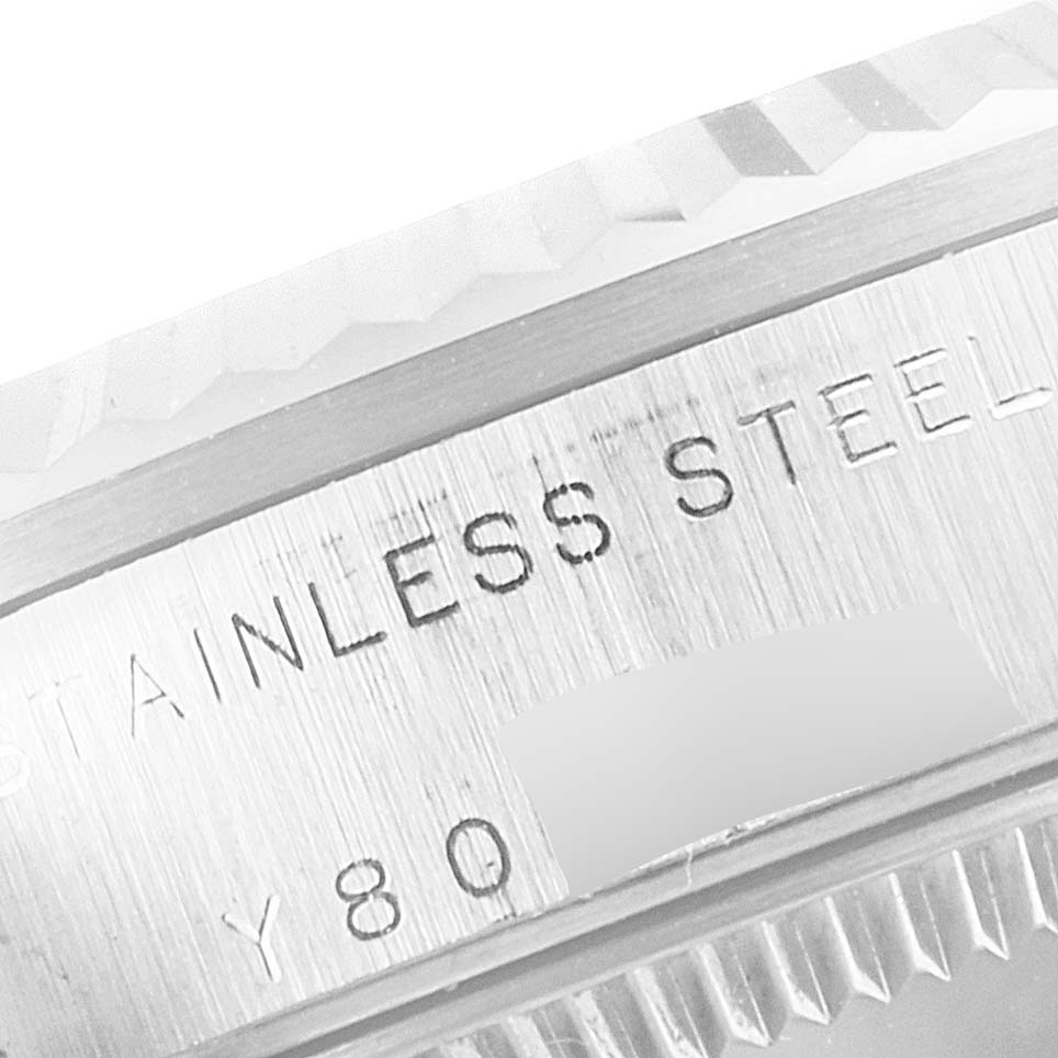 This image shows a close-up angle of the stainless steel case with engraved text on a Rolex Mid-Size 78274 Women
s Stainless Steel Mother of Pearl Dial 78274 Women
s Stainless Steel Mother of Pearl Dial watch.