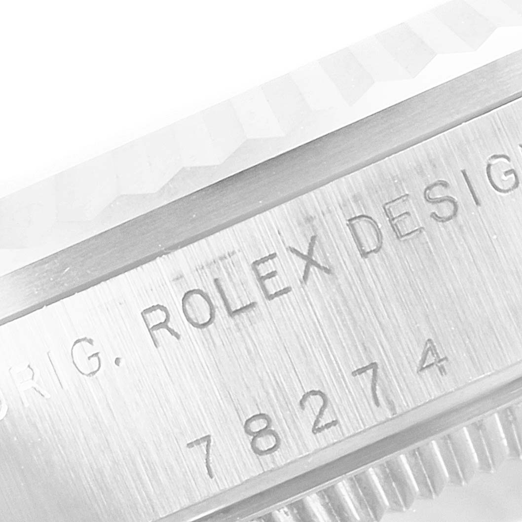 Close-up view of the case and bezel inscription on a Mid-Size Rolex watch, showing the model number 78274.