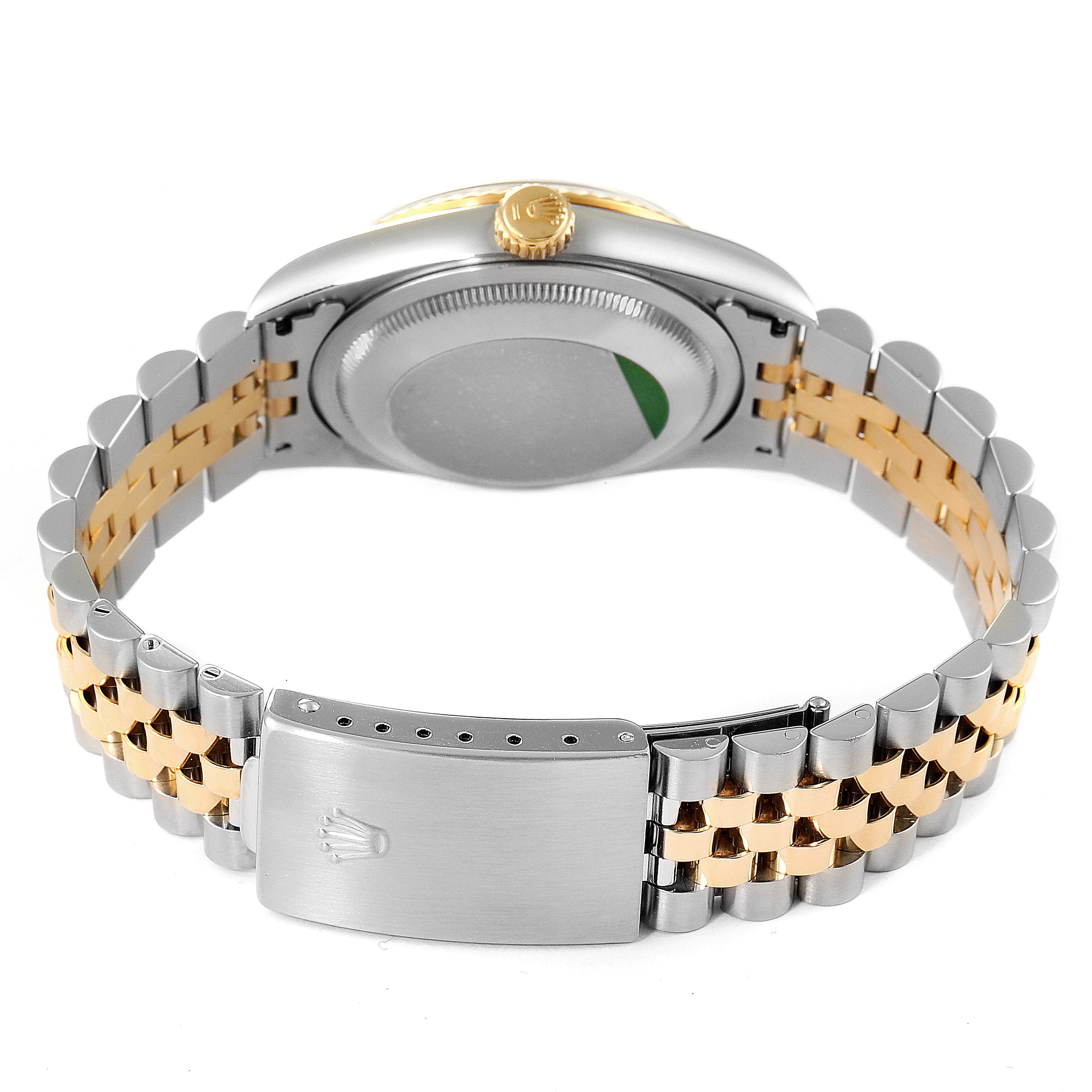 This image shows the back view of a Rolex Datejust 16233 Men's Steel and Gold (two tone) Black Dial 16233 Men's Steel and Gold (two tone) Black Dial watch, highlighting the bracelet, clasp, and case back.