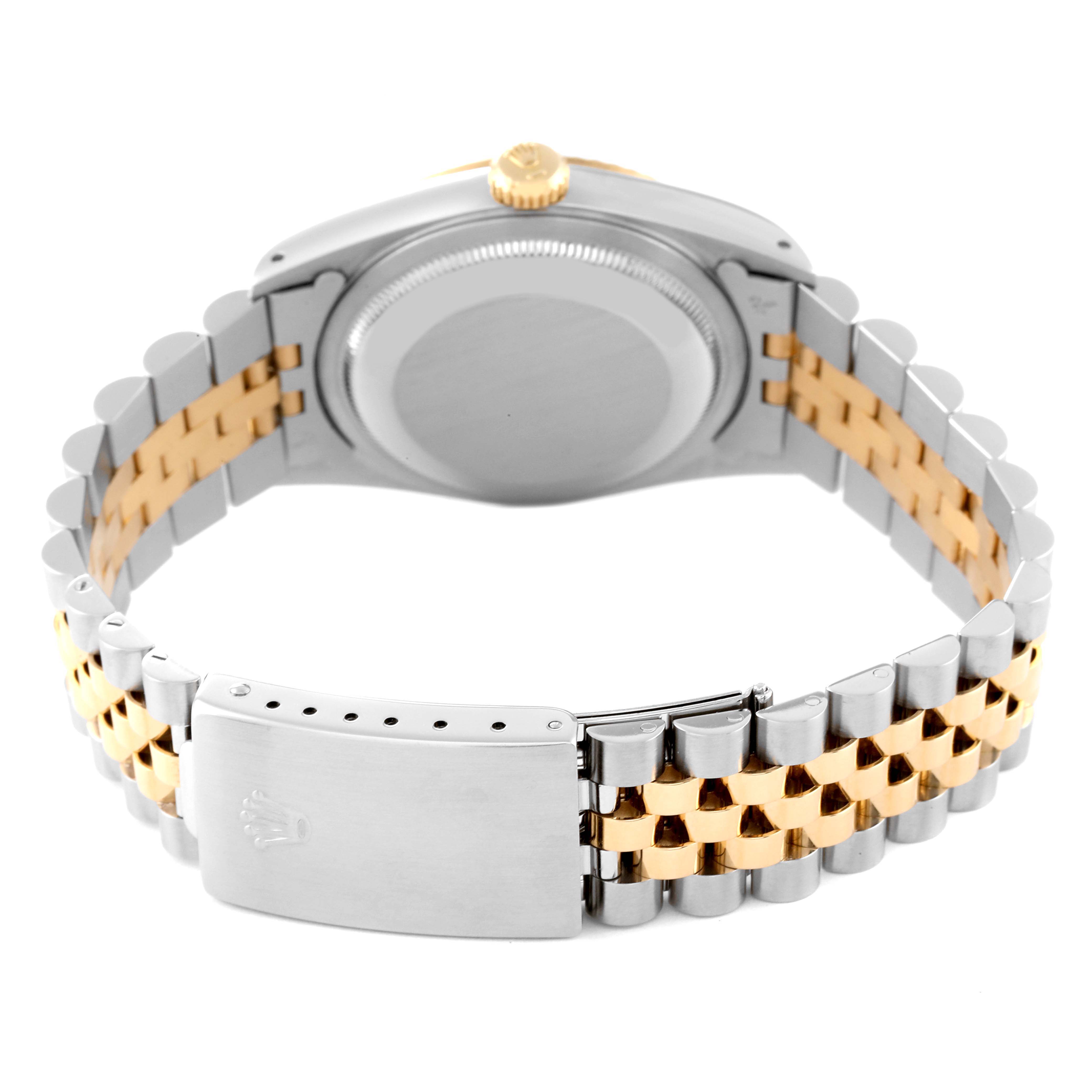 The image shows the back view of a Rolex Datejust 16233 Men's Steel and Gold (two tone) Champagne Dial 16233 Men's Steel and Gold (two tone) Champagne Dial watch, featuring its two-tone jubilee bracelet and clasp.