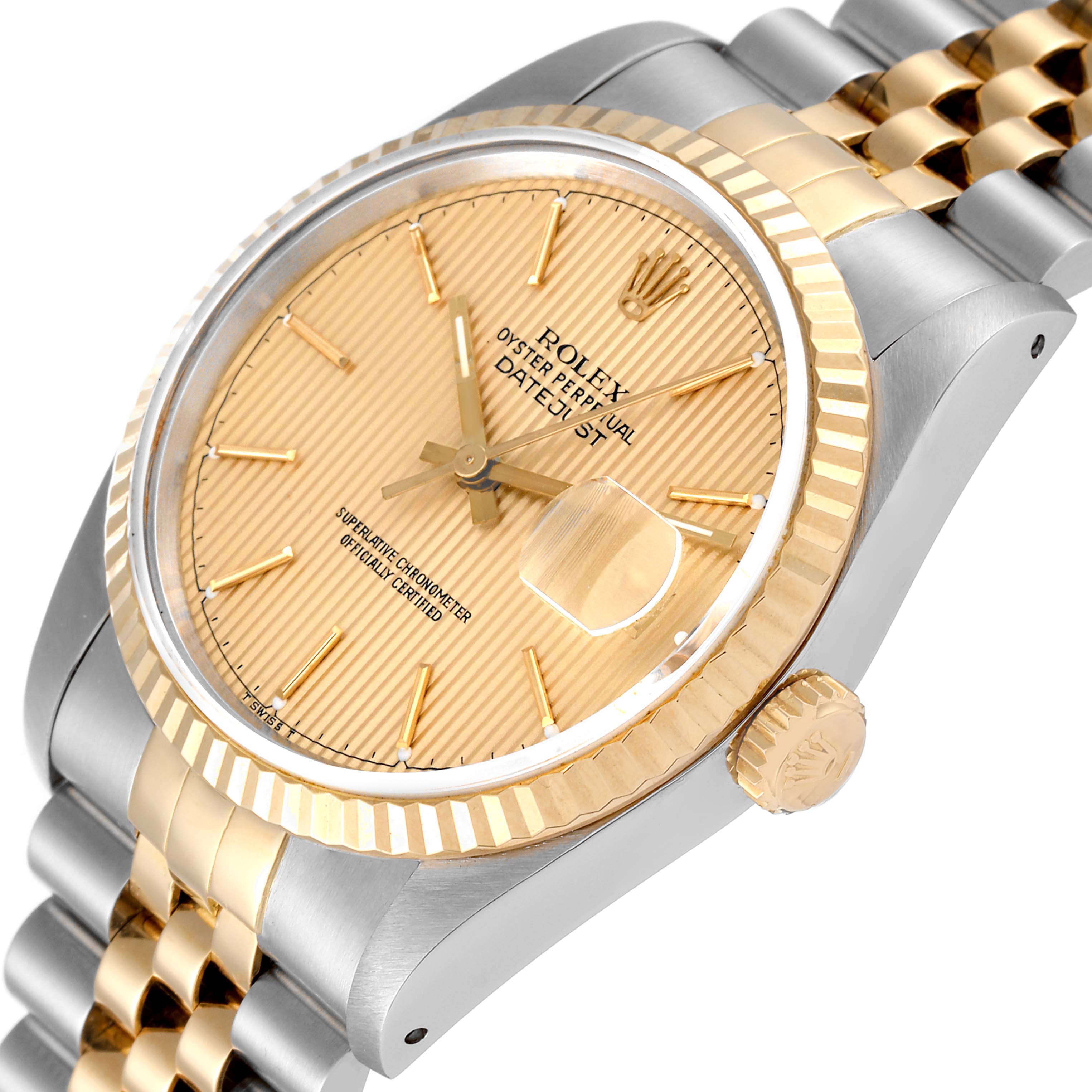 The image shows a side view of a Rolex Datejust 16233 Men's Steel and Gold (two tone) Champagne Dial 16233 Men's Steel and Gold (two tone) Champagne Dial watch with visible details of the dial, bezel, crown, and part of the bracelet.