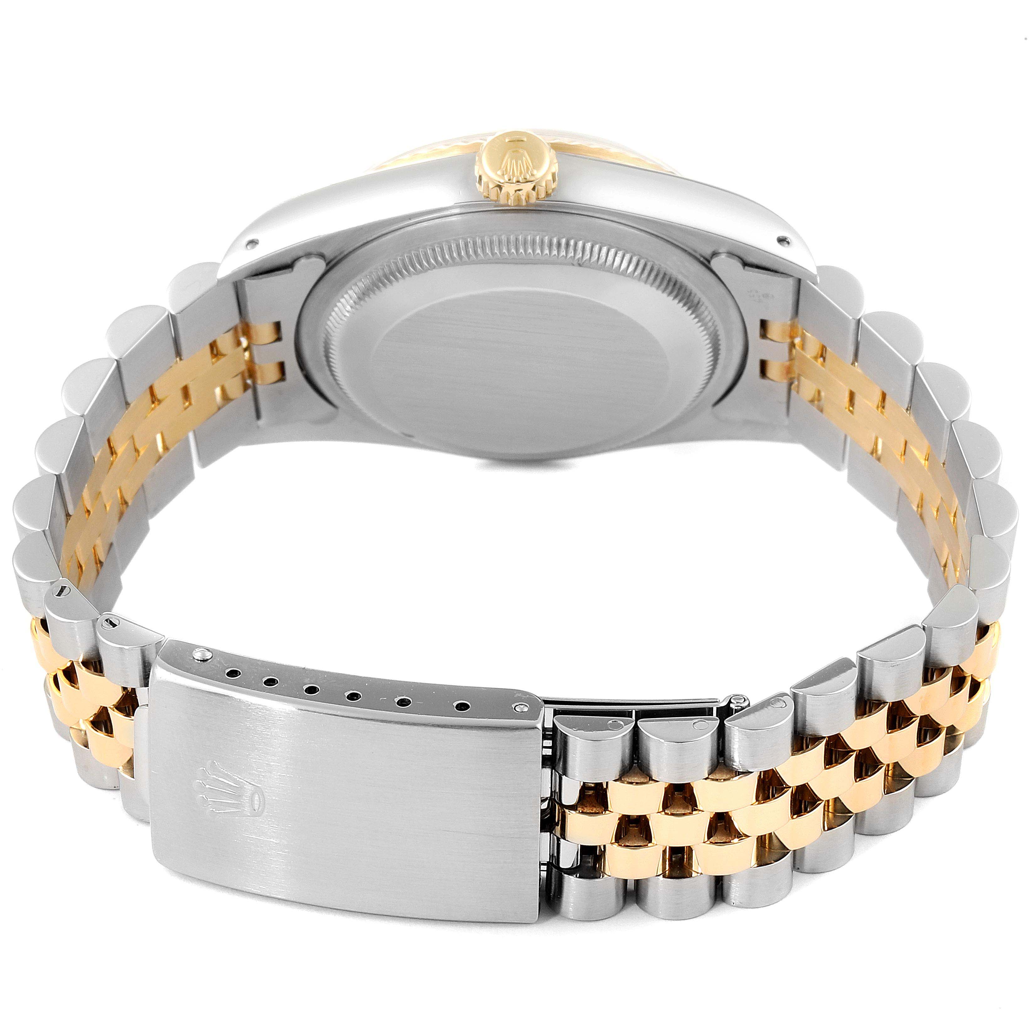 This image shows the back and clasp of a Rolex Datejust 16233 Men's Steel and Gold (two tone) Champagne Dial 16233 Men's Steel and Gold (two tone) Champagne Dial watch, highlighting the two-tone bracelet and case back.