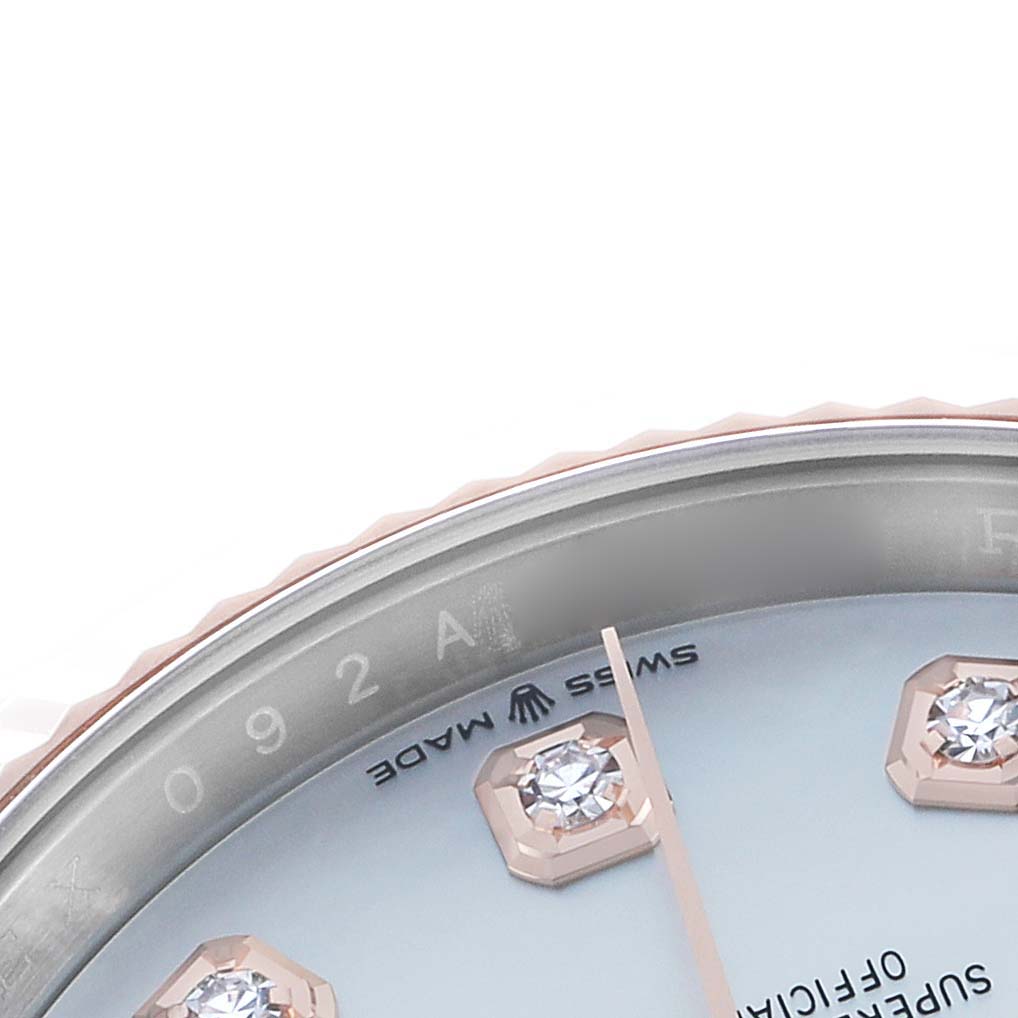 The image shows a partial view of the dial and bezel of a Rolex Datejust 126231 Men's Steel and Gold (two tone) Mother of Pearl Dial, featuring diamond hour markers.
