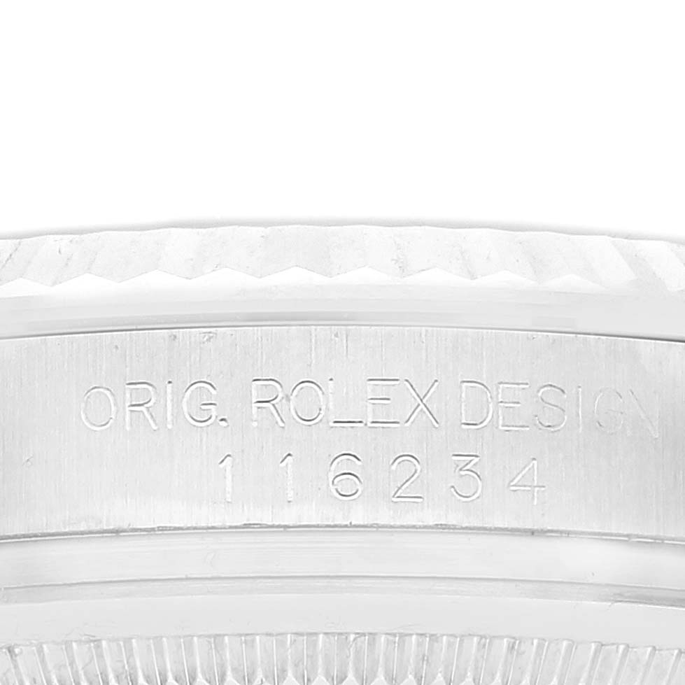 A close-up view of the case back of a Rolex Datejust 116234 Men's Stainless Steel Blue Dial 116234 Men's Stainless Steel Blue Dial, showing the engraving and model number "116234."