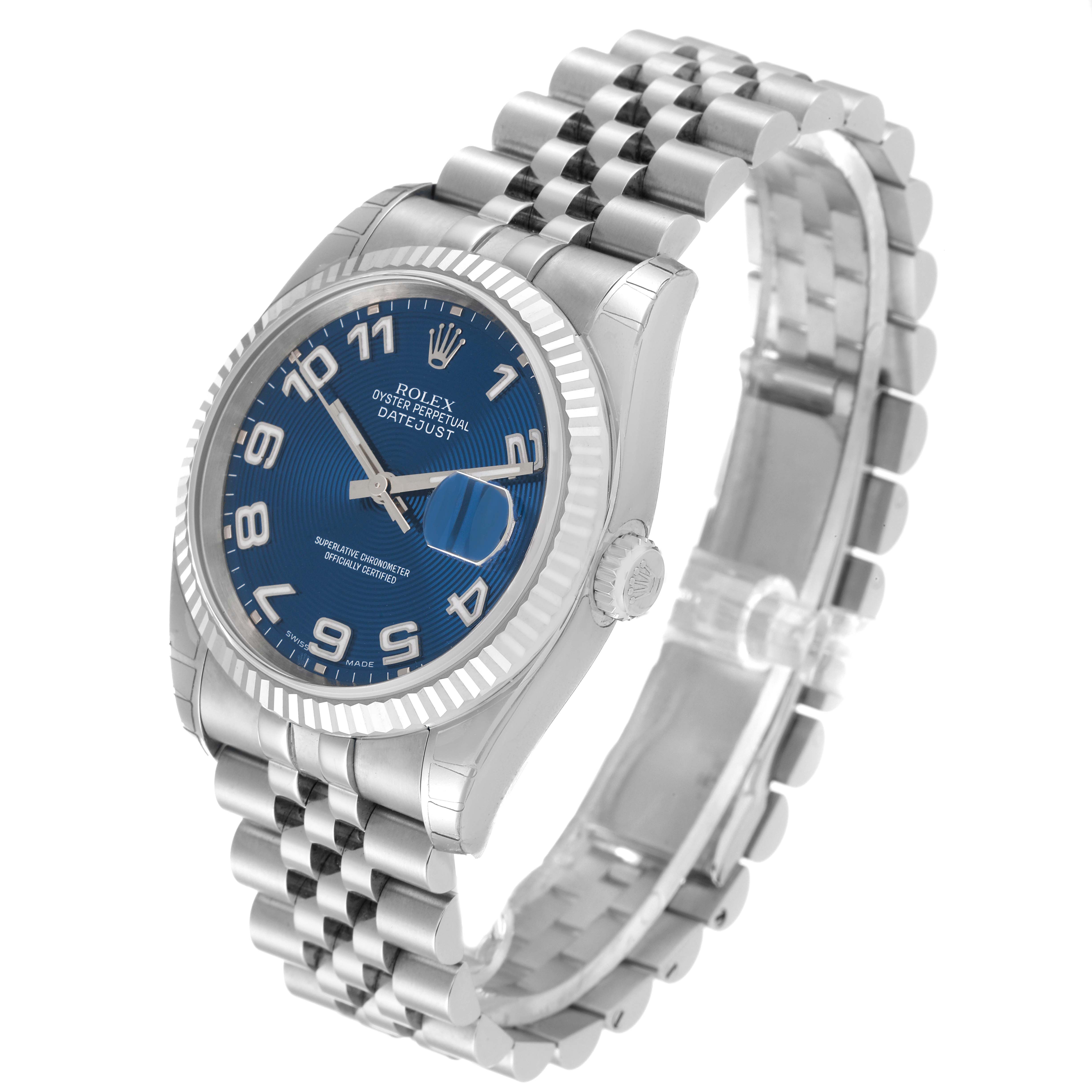 The Rolex Datejust 116234 Men's Stainless Steel Blue Dial 116234 Men's Stainless Steel Blue Dial watch is shown at a slight angle, highlighting its blue dial, fluted bezel, and Jubilee bracelet.