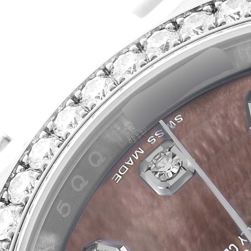 The image shows a close-up of the Rolex Datejust 116244 Men's Stainless Steel Mother of Pearl Dial's diamond-encrusted bezel and part of the dial with "Swiss Made" visible.