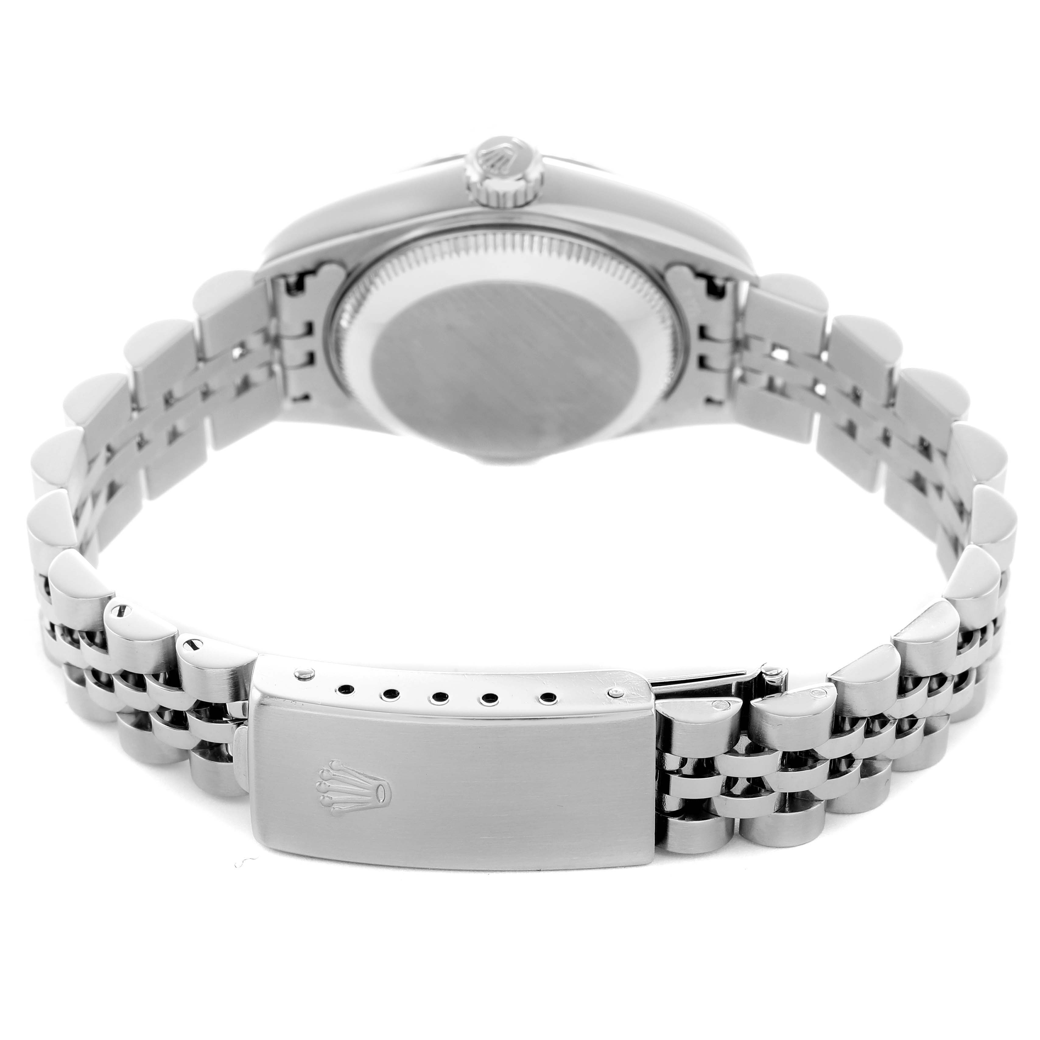 The image shows the back of a Rolex Datejust 79174 Women's Stainless Steel Pink Dial watch, highlighting the bracelet and clasp with the Rolex logo.