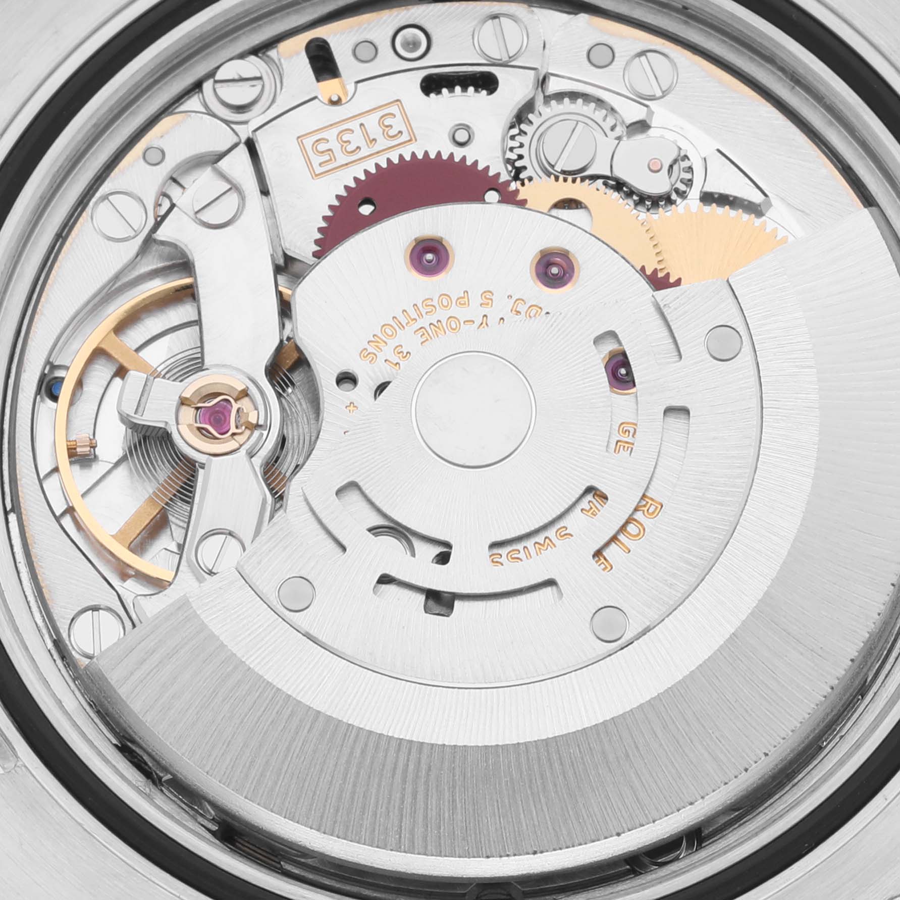 The image shows the movement of a Rolex Datejust 116233 Men
s Steel and Gold (two tone) Champagne Dial 116233 Men
s Steel and Gold (two tone) Champagne Dial watch from a top-down angle, highlighting its intricate mechanics.