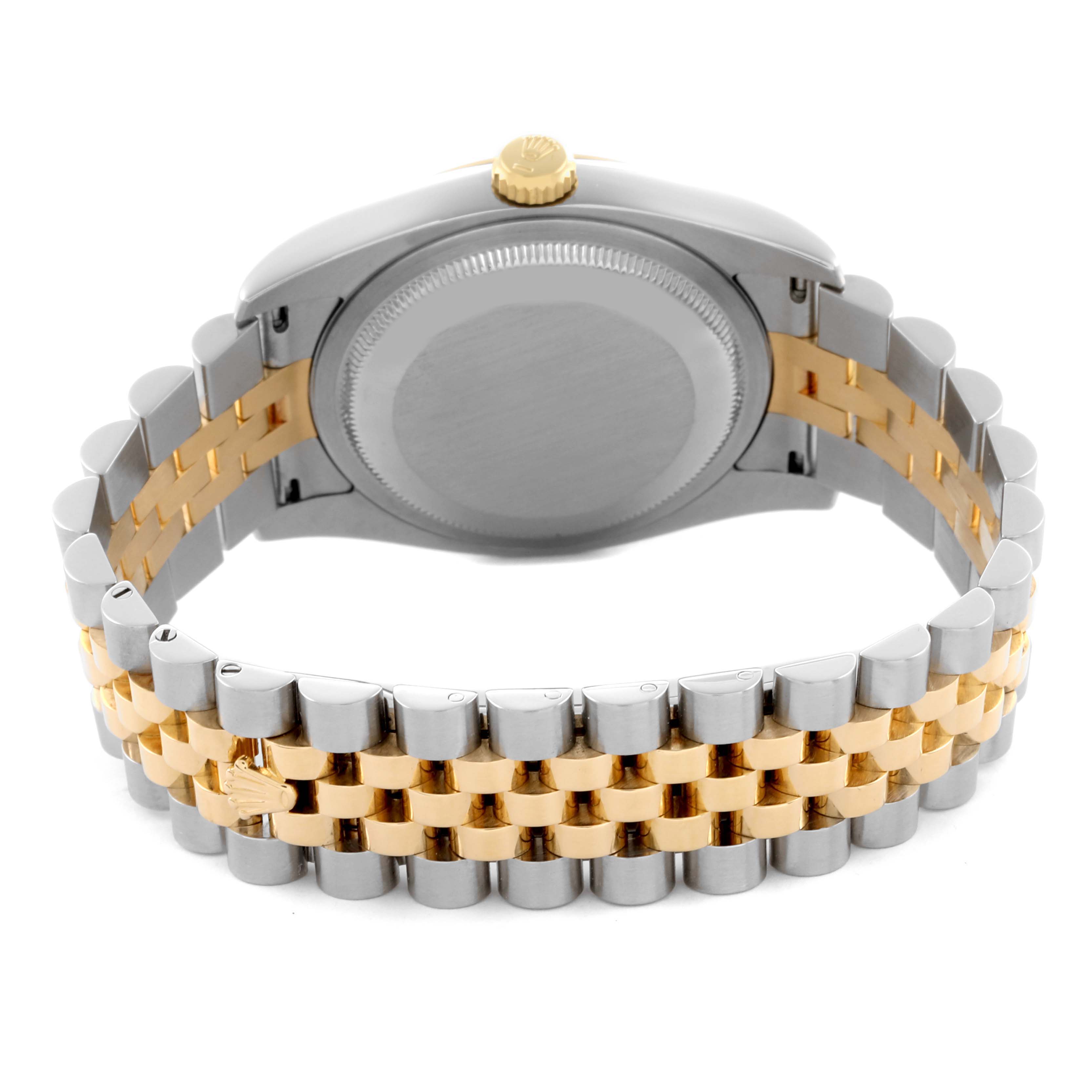 This image shows the back and bracelet of a Rolex Datejust 116233 Men
s Steel and Gold (two tone) Champagne Dial 116233 Men
s Steel and Gold (two tone) Champagne Dial, highlighting the two-tone metal design.