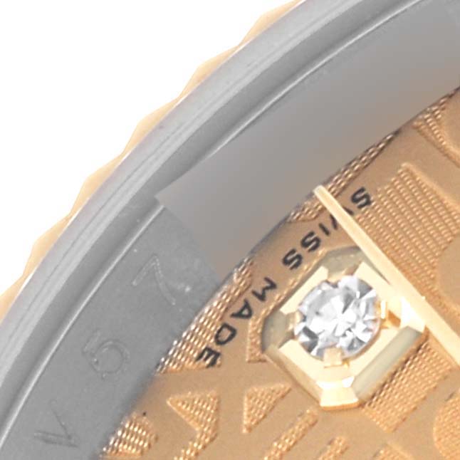 The image shows a close-up of the dial and bezel detail of a Rolex Datejust 116233 Men
s Steel and Gold (two tone) Champagne Dial 116233 Men
s Steel and Gold (two tone) Champagne Dial watch, highlighting a diamond marker.