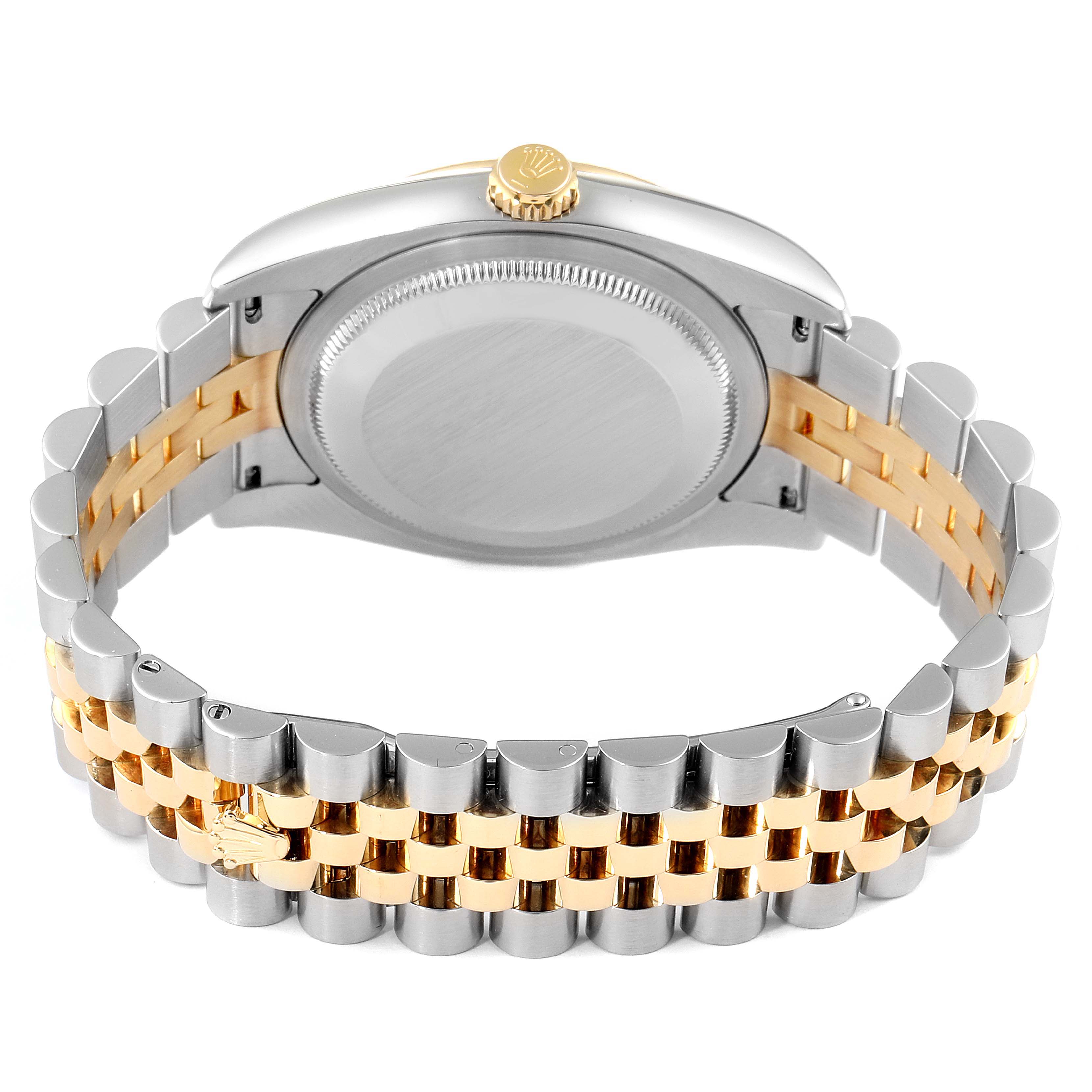 The image shows the back view of a Rolex Datejust 116233 Men's Steel and Gold (two tone) Black Dial 116233 Men's Steel and Gold (two tone) Black Dial watch, highlighting its case back, crown, and two-tone bracelet.