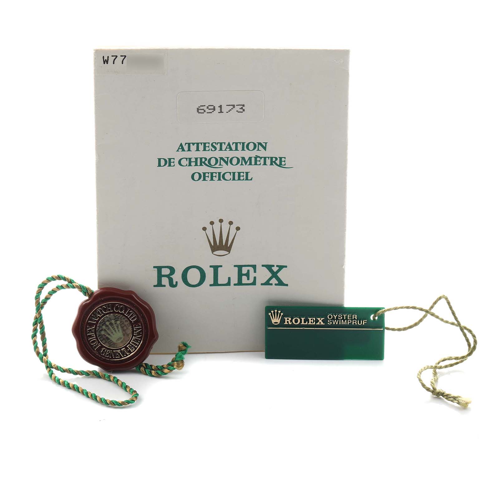 The image shows a Rolex Datejust 69173 Women's Steel and Gold (two tone) Champagne Dial warranty booklet, tag, and seal, all displayed from the front.