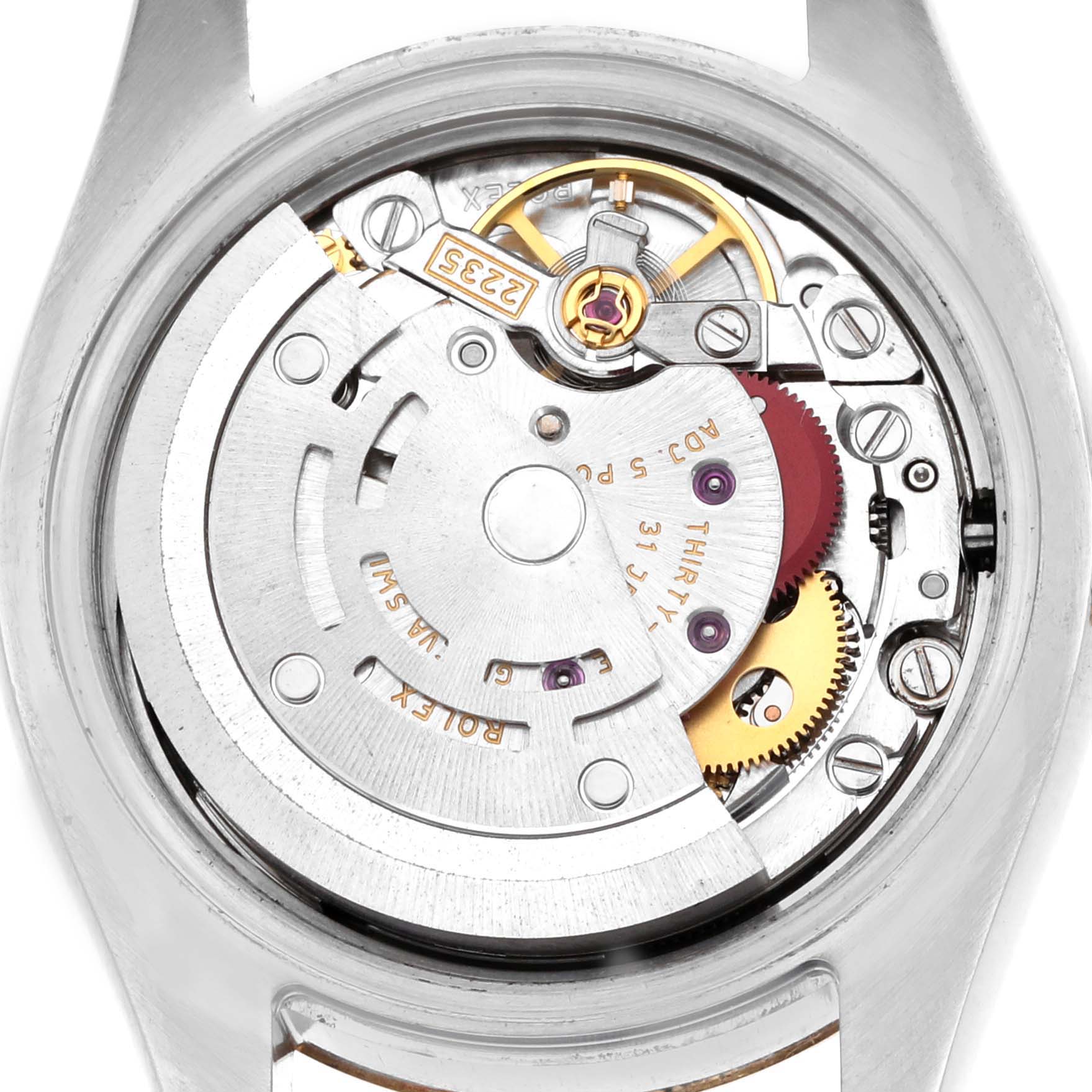 The image shows the movement mechanism of a Rolex Datejust 179173 Women's Steel and Gold (two tone) Black Dial watch from the back, highlighting gears and components.