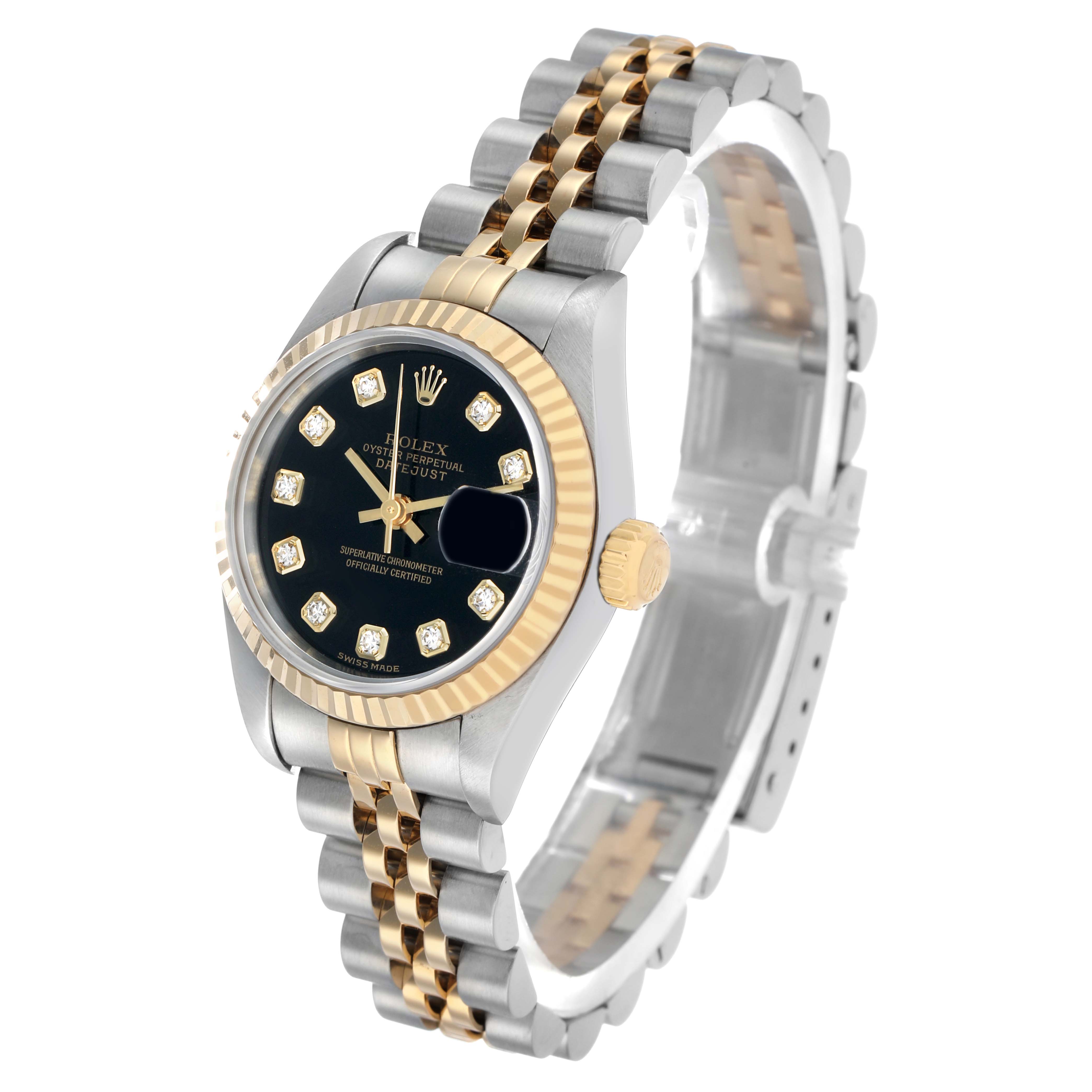The Rolex Datejust 79173 Women's Steel and Gold (two tone) Black Dial watch is shown at a slight angle, highlighting the face, bezel, crown, and two-tone bracelet.