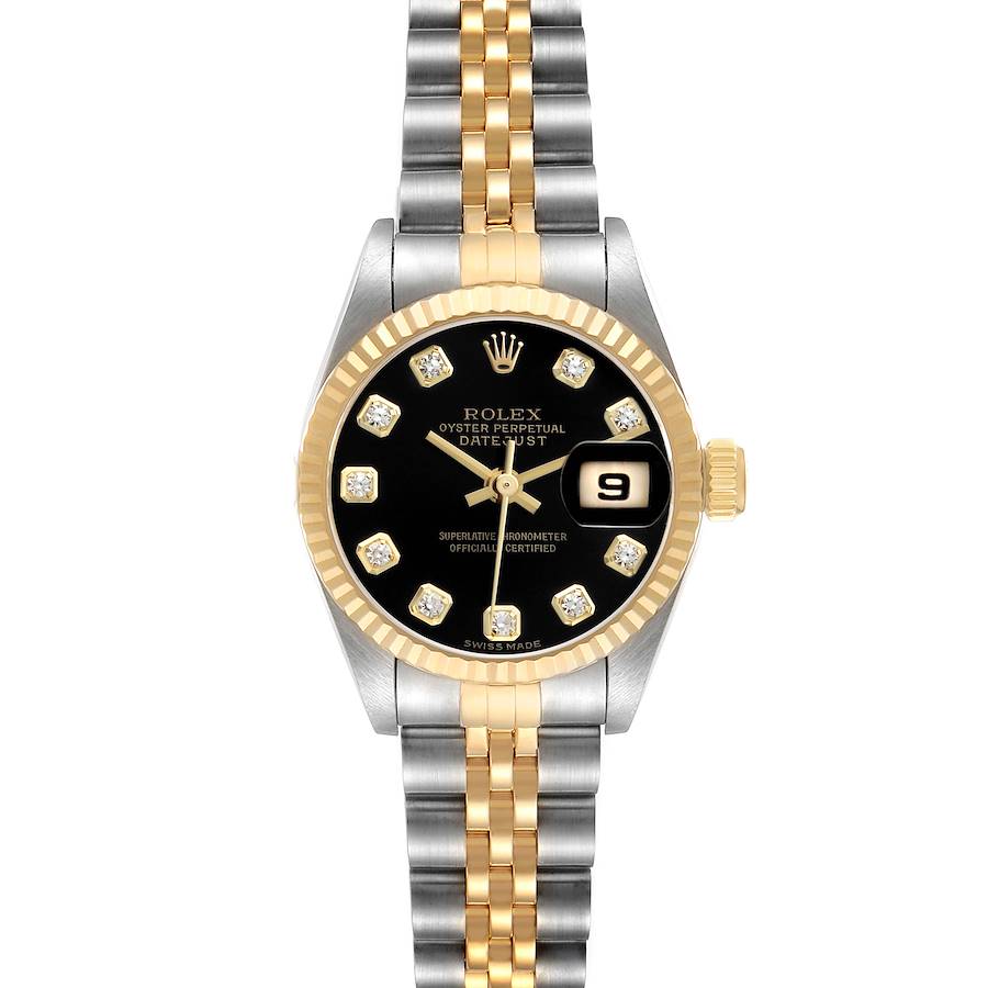 The Rolex Datejust 79173 Women's Steel and Gold (two tone) Black Dial watch is shown from a top-down angle, displaying its black dial, gold bezel, and two-tone bracelet.