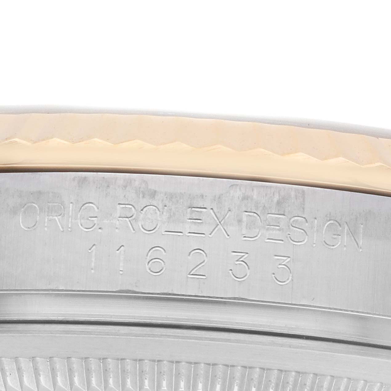 This image shows a close-up angle highlighting the bezel and engraving details of the Rolex Datejust 116233 Men's Steel and Gold (two tone) Silver Dial.