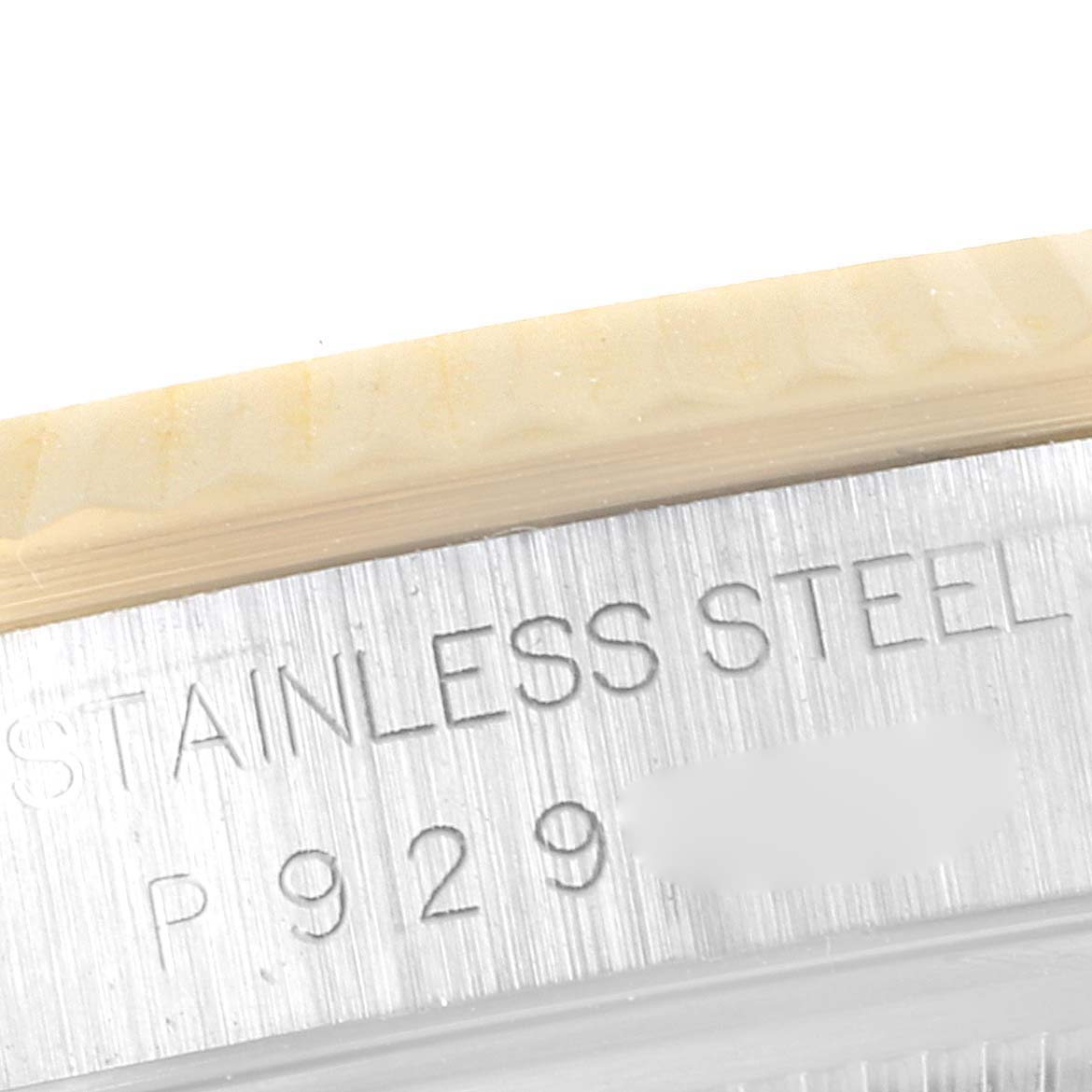 This image shows a close-up of the stainless steel case with engravings on the Rolex Datejust 16233 Men
s Steel and Gold (two tone) Beige Dial 16233 Men
s Steel and Gold (two tone) Beige Dial watch.