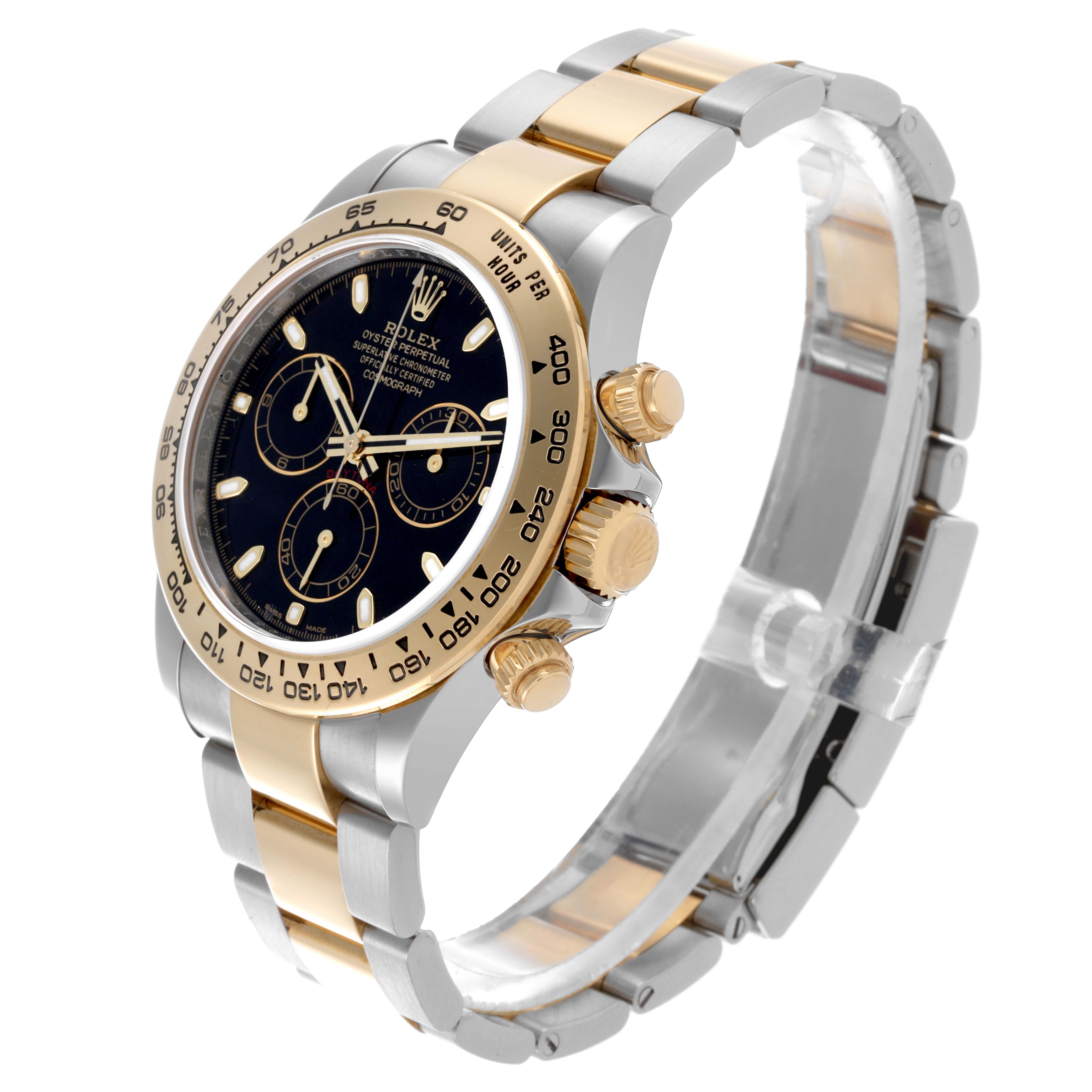 The Rolex Daytona 116503 Men
s Steel and Gold (two tone) Black Dial 116503 Men
s Steel and Gold (two tone) Black Dial is displayed at a three-quarter angle showing its bezel, dial, band, and side pushers.