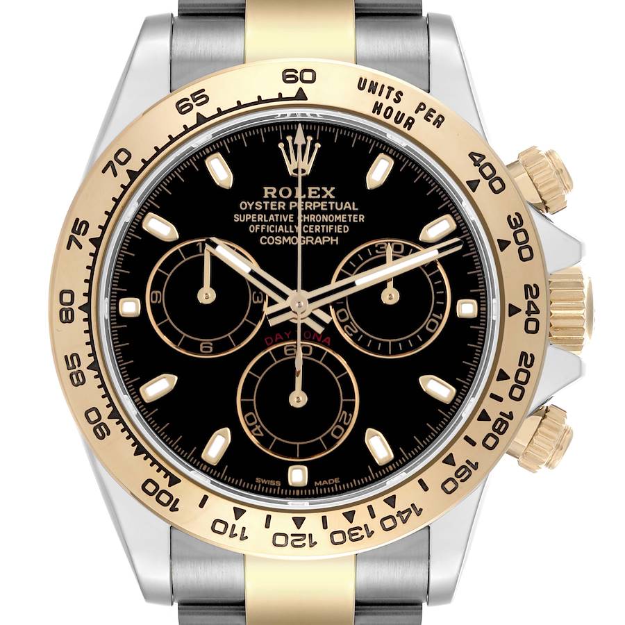 The Rolex Daytona watch is shown from the front, displaying its black dial, gold bezel, and chronograph features.