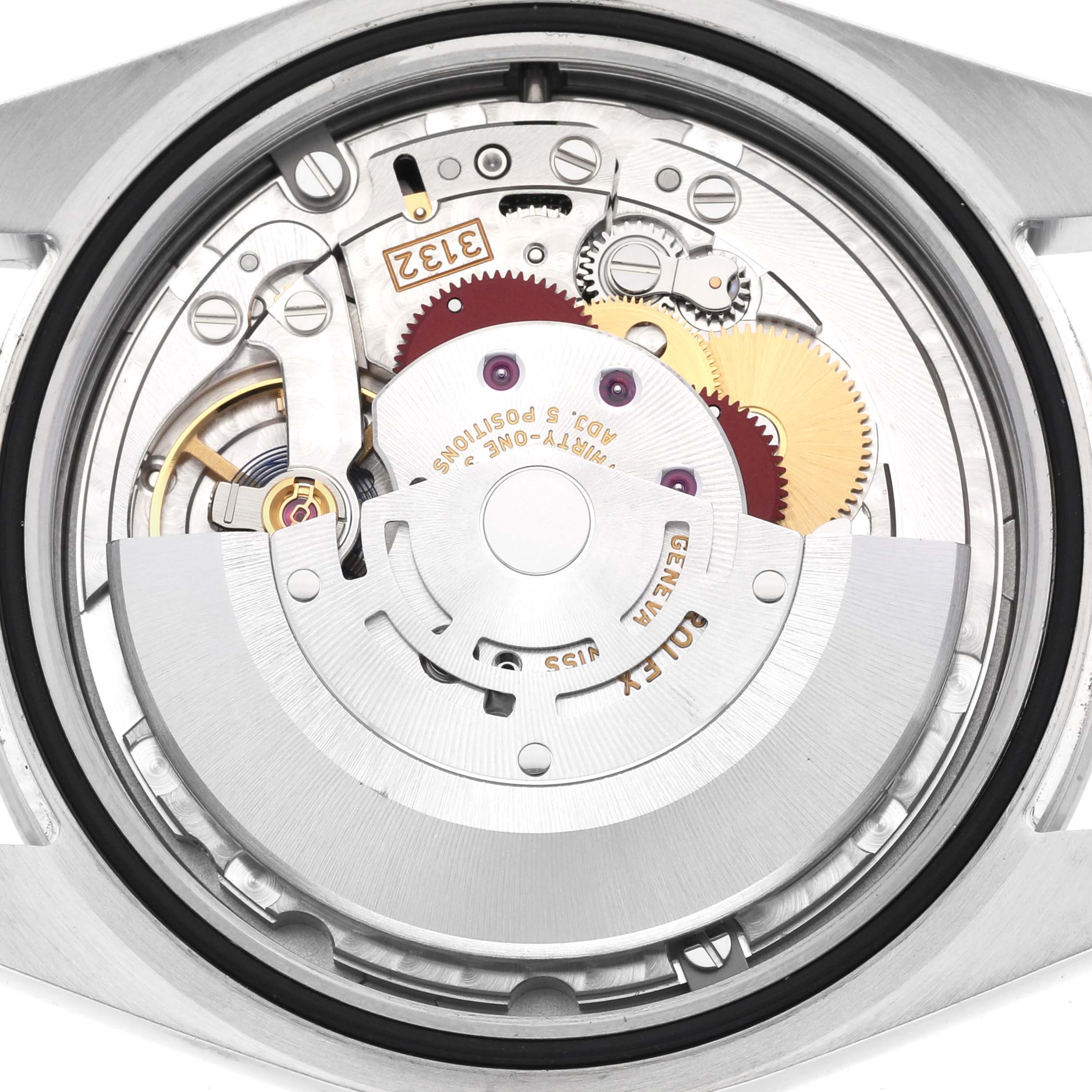 The image shows the internal mechanism of a Rolex Explorer 214270 Men
s Stainless Steel Black Dial 214270 Men
s Stainless Steel Black Dial watch viewed from the back.