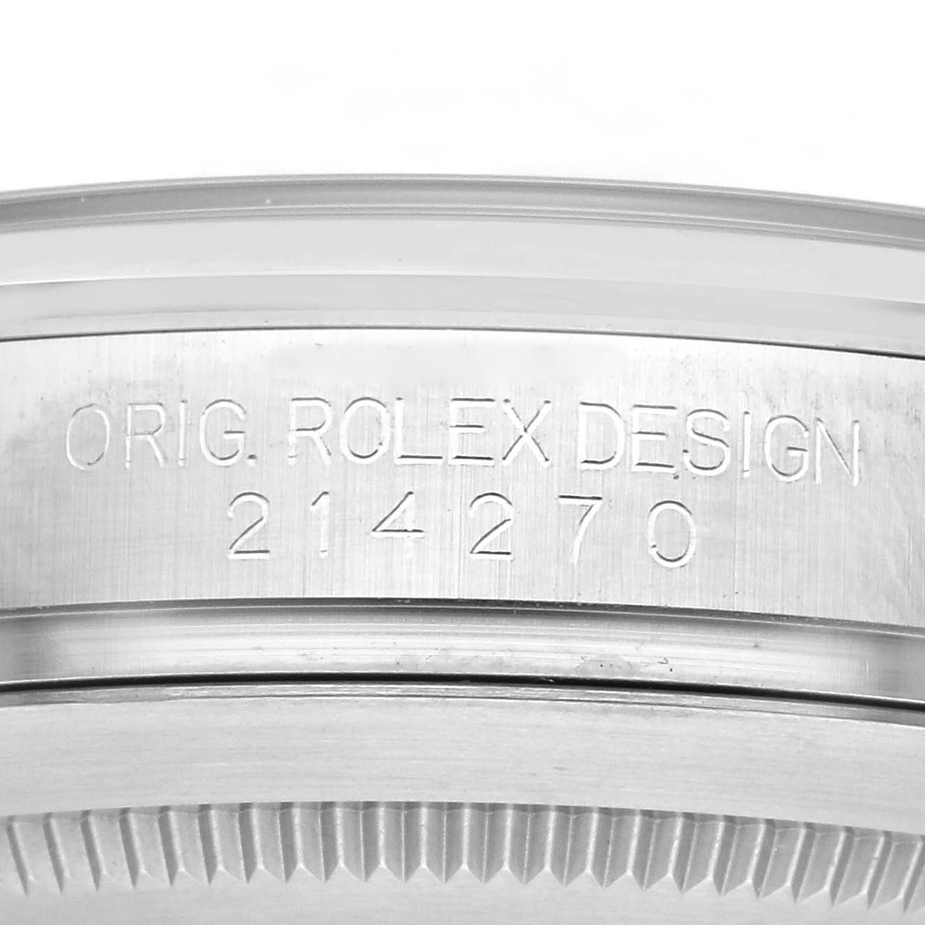 The image shows a detailed close-up of the side engraving on the Rolex Explorer 214270 Men
s Stainless Steel Black Dial 214270 Men
s Stainless Steel Black Dial model, displaying "ORIG. ROLEX DESIGN 214270."