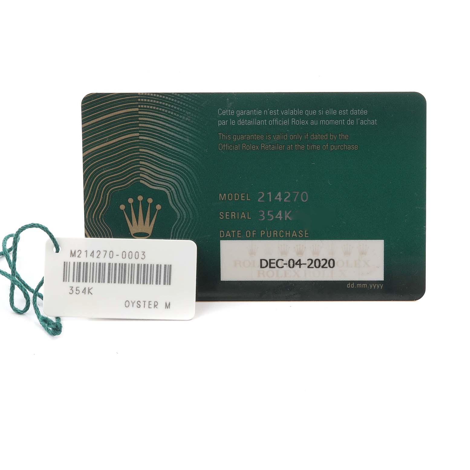 The image shows a warranty card and tag for a Rolex Explorer 214270 Men
s Stainless Steel Black Dial 214270 Men
s Stainless Steel Black Dial, model 214270.