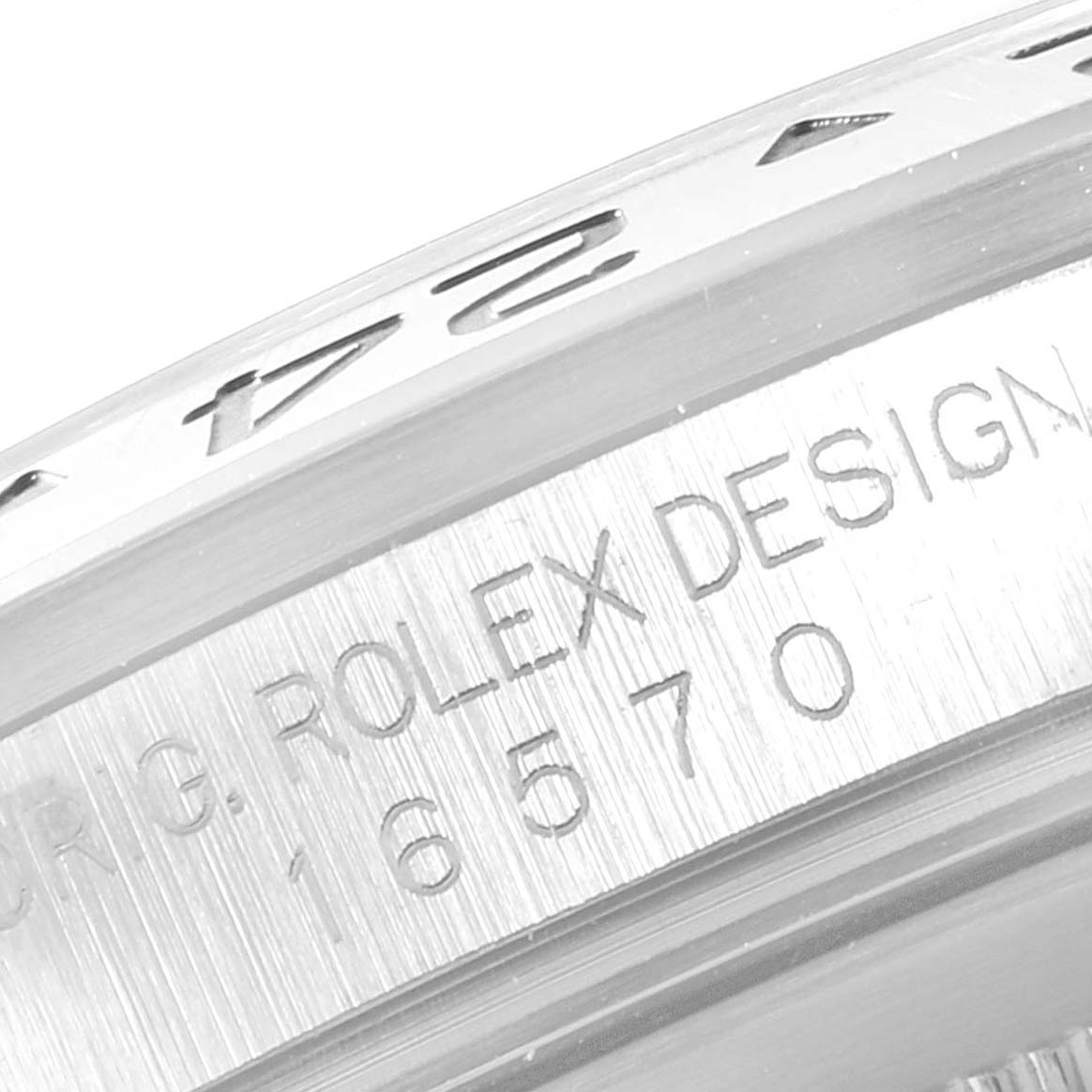 The image shows a close-up view of the side engraving and bezel of a Rolex Explorer 16570 Men
s Stainless Steel Black Dial 16570 Men
s Stainless Steel Black Dial watch.