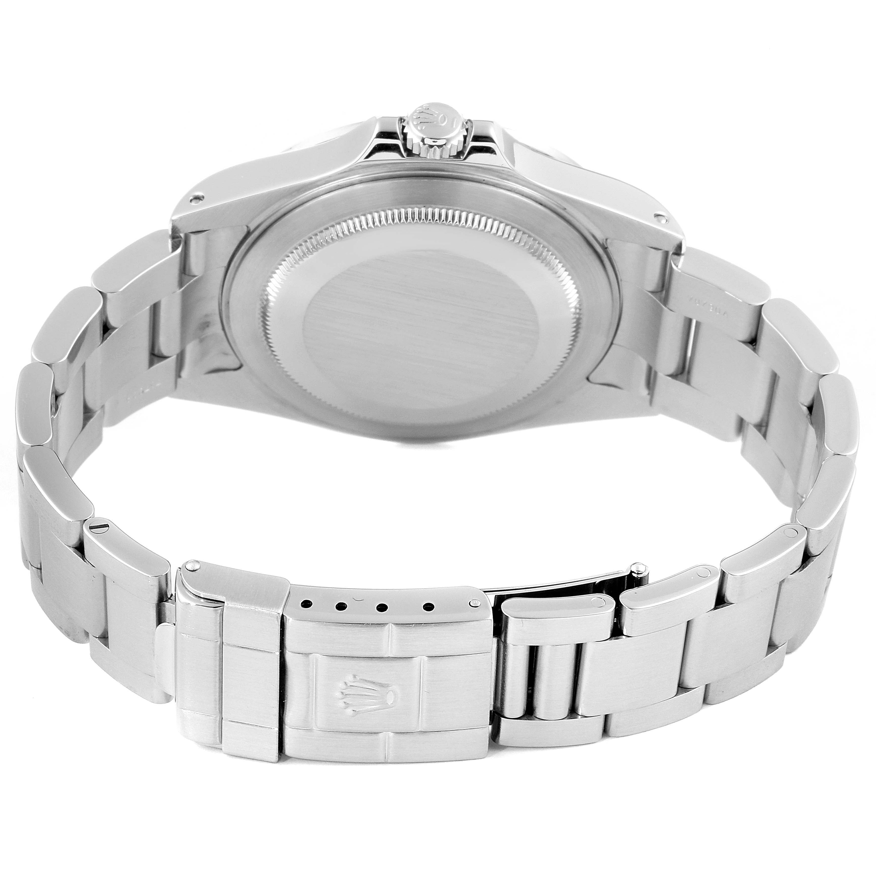 The image shows the back case, crown, and bracelet of a Rolex Explorer 16570 Men
s Stainless Steel Black Dial 16570 Men
s Stainless Steel Black Dial model watch.