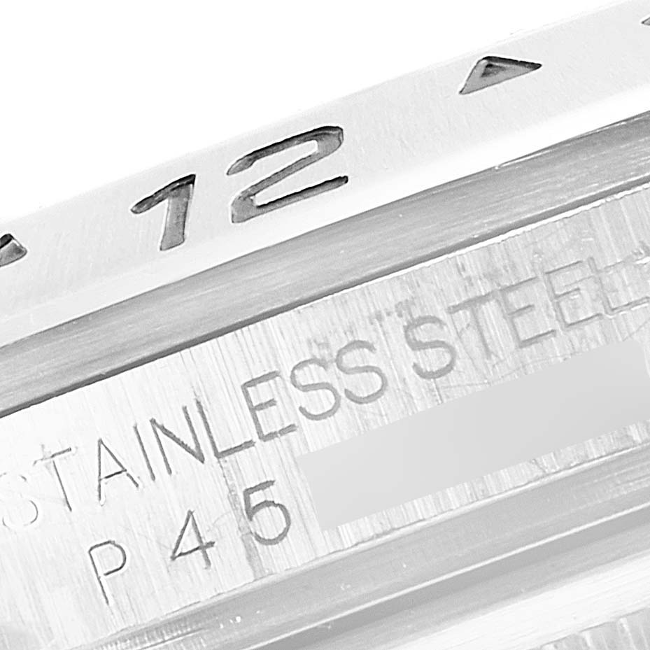 The image shows a close-up of the bezel and engraved details of the Rolex Explorer 16570 Men
s Stainless Steel Black Dial 16570 Men
s Stainless Steel Black Dial watch.