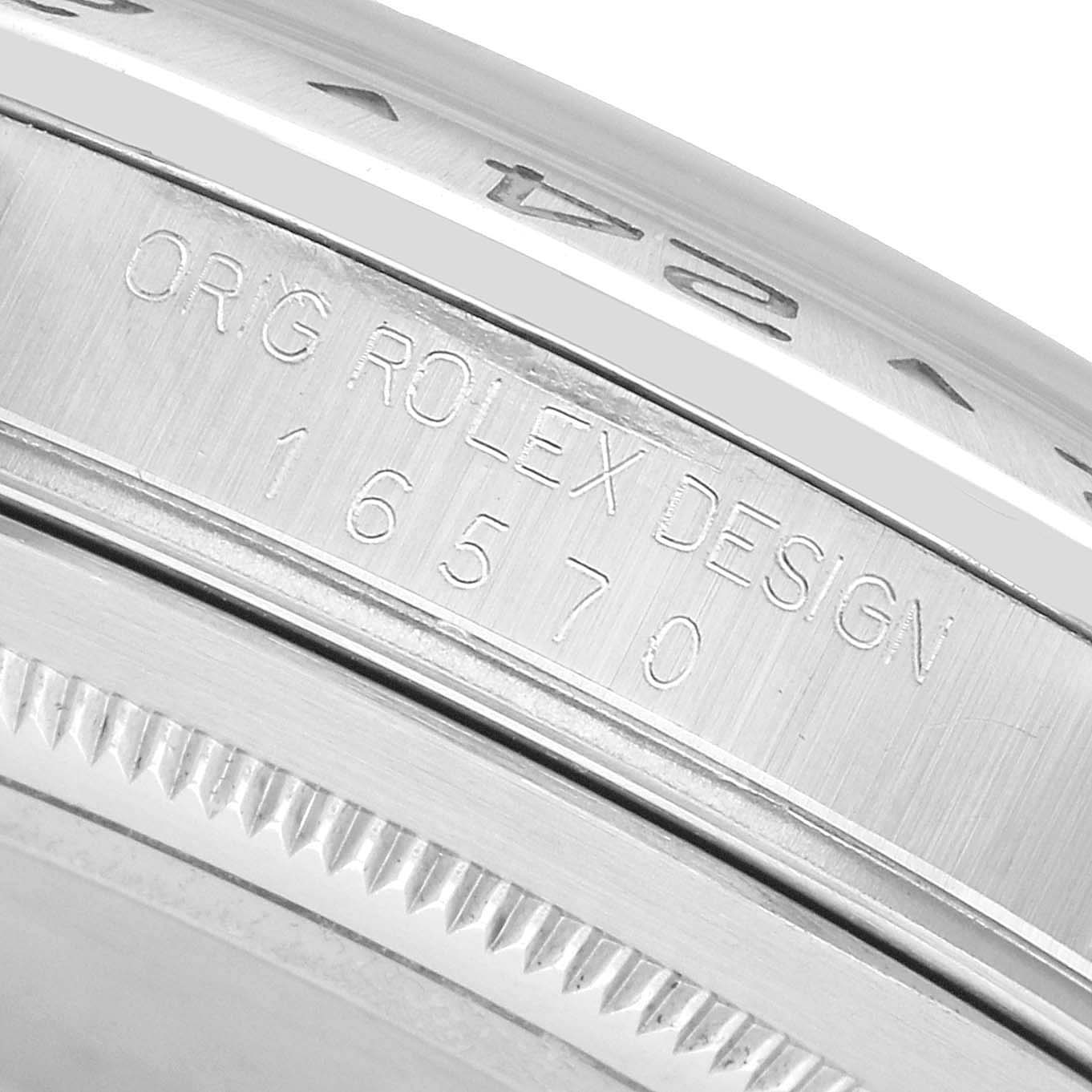 The image shows a close-up of the side of a Rolex Explorer 16570 Men's Stainless Steel White Dial watch, highlighting the engraved "ORG ROLEX DESIGN 16570" on the case.
