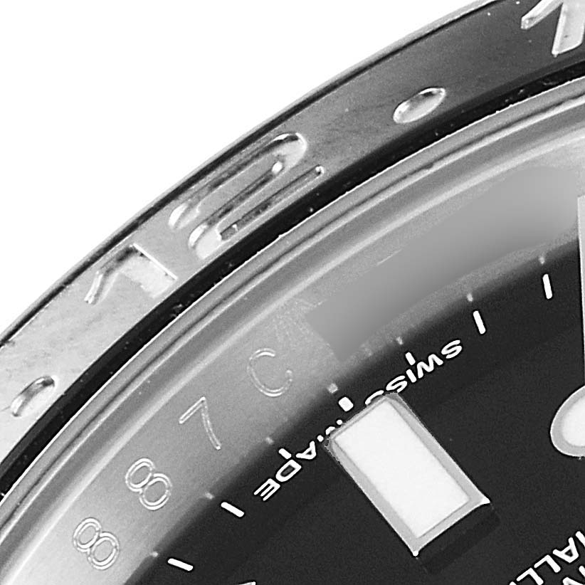 The image shows a close-up of the bezel and dial with the "Swiss Made" text of a Rolex GMT-Master 116710 Men
s Stainless Steel Black Dial 116710 Men
s Stainless Steel Black Dial watch.