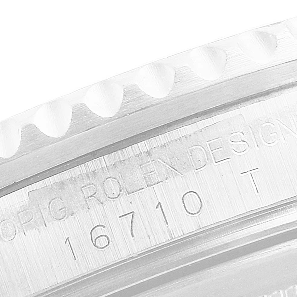 This close-up angle shows the model engraving and bezel edge of a Rolex GMT-Master 16710 Men
s Stainless Steel Black Dial 16710 Men
s Stainless Steel Black Dial watch.